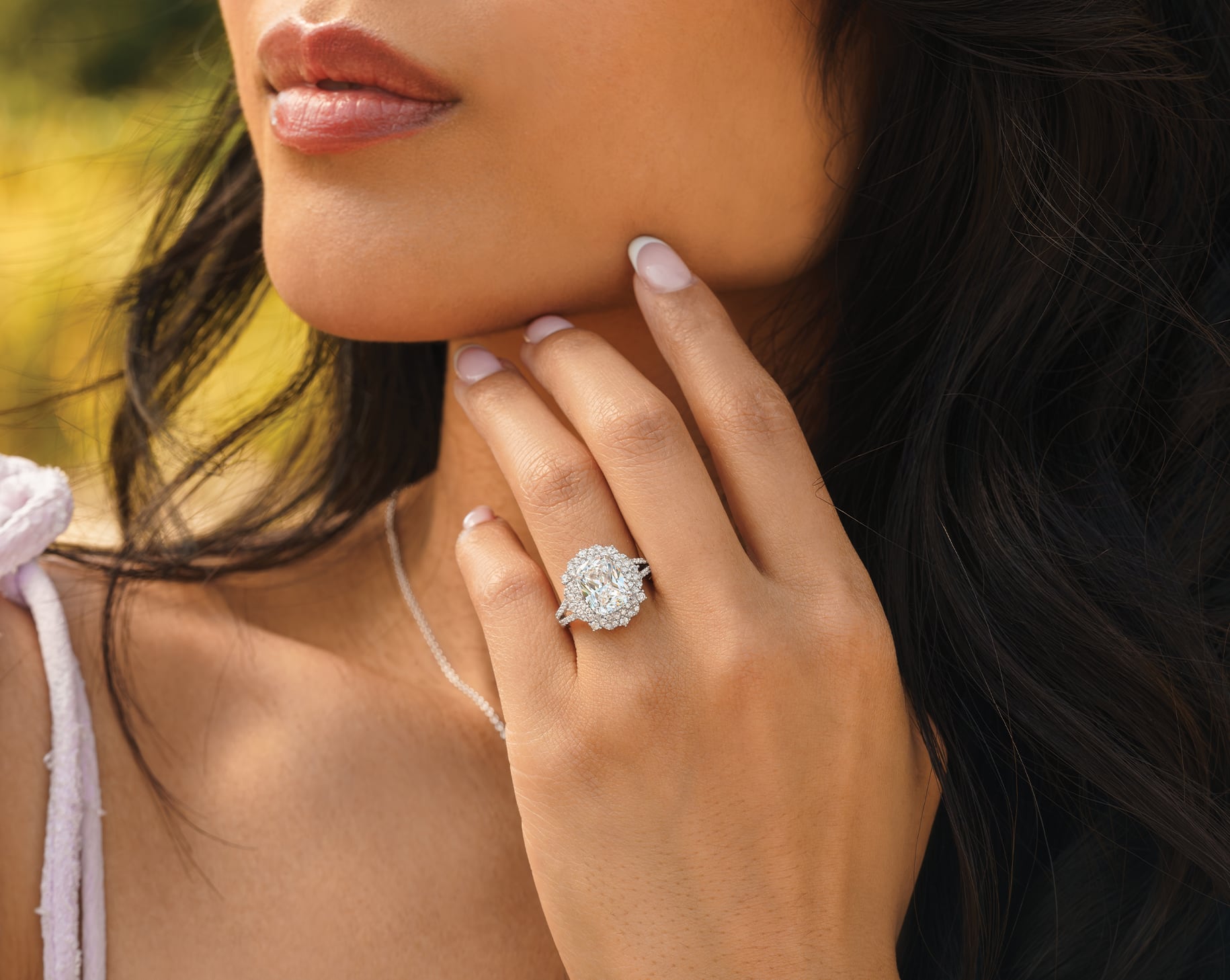 woman wearing beautiful sol vintage engagement ring