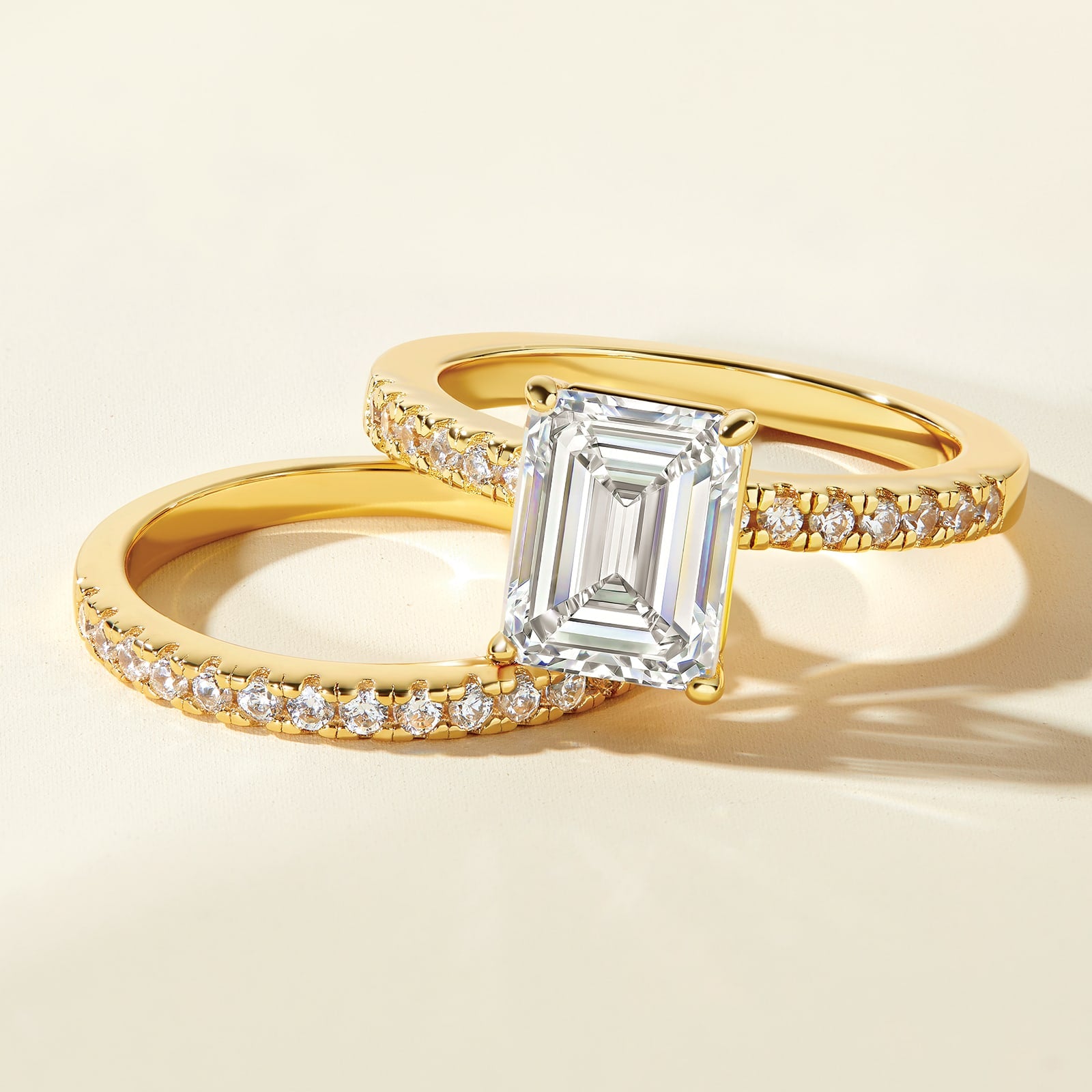 beautiful emerald cut engagement ring with promise gold wedding band