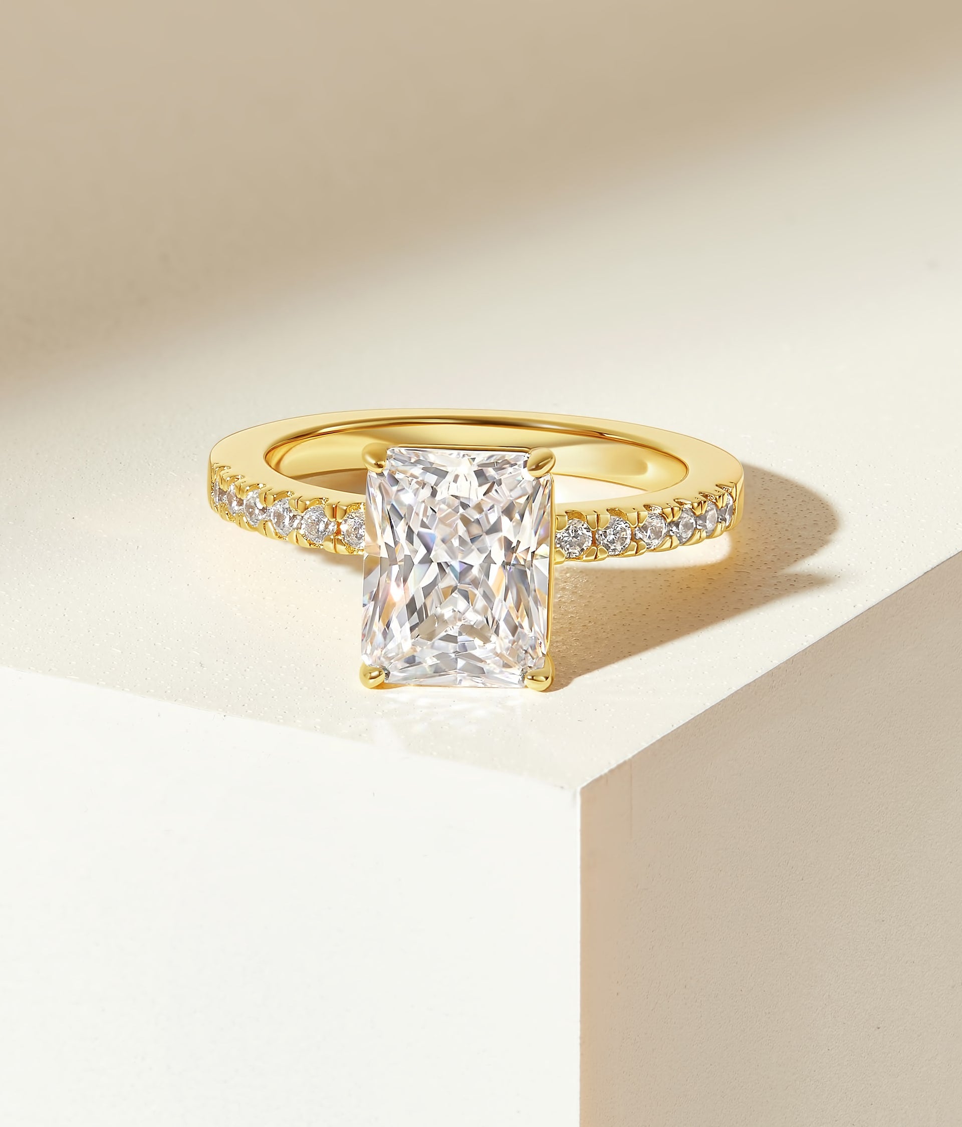 beautiful gold radiant cut engagement ring with half eternity