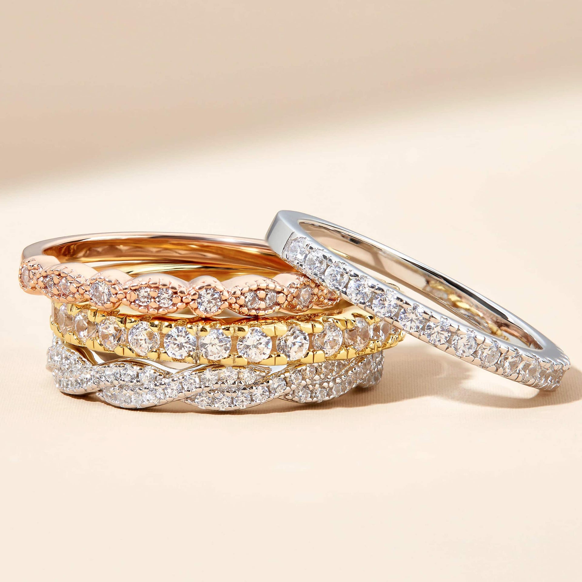 wedding band stack with rose gold forever