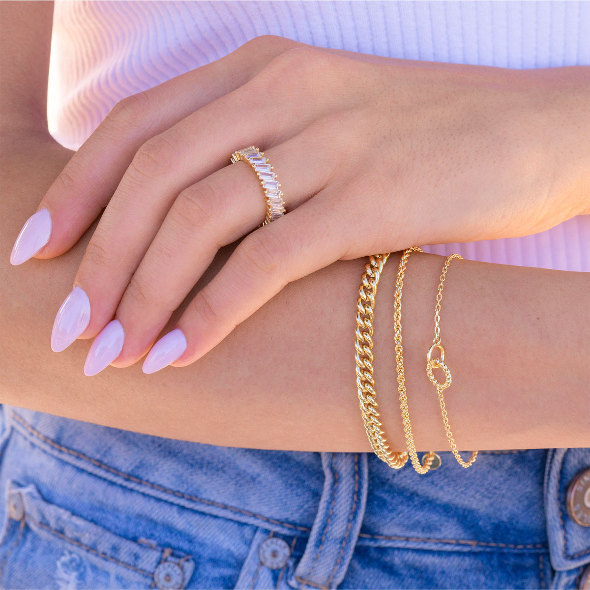 Unique gold bracelet stack on model