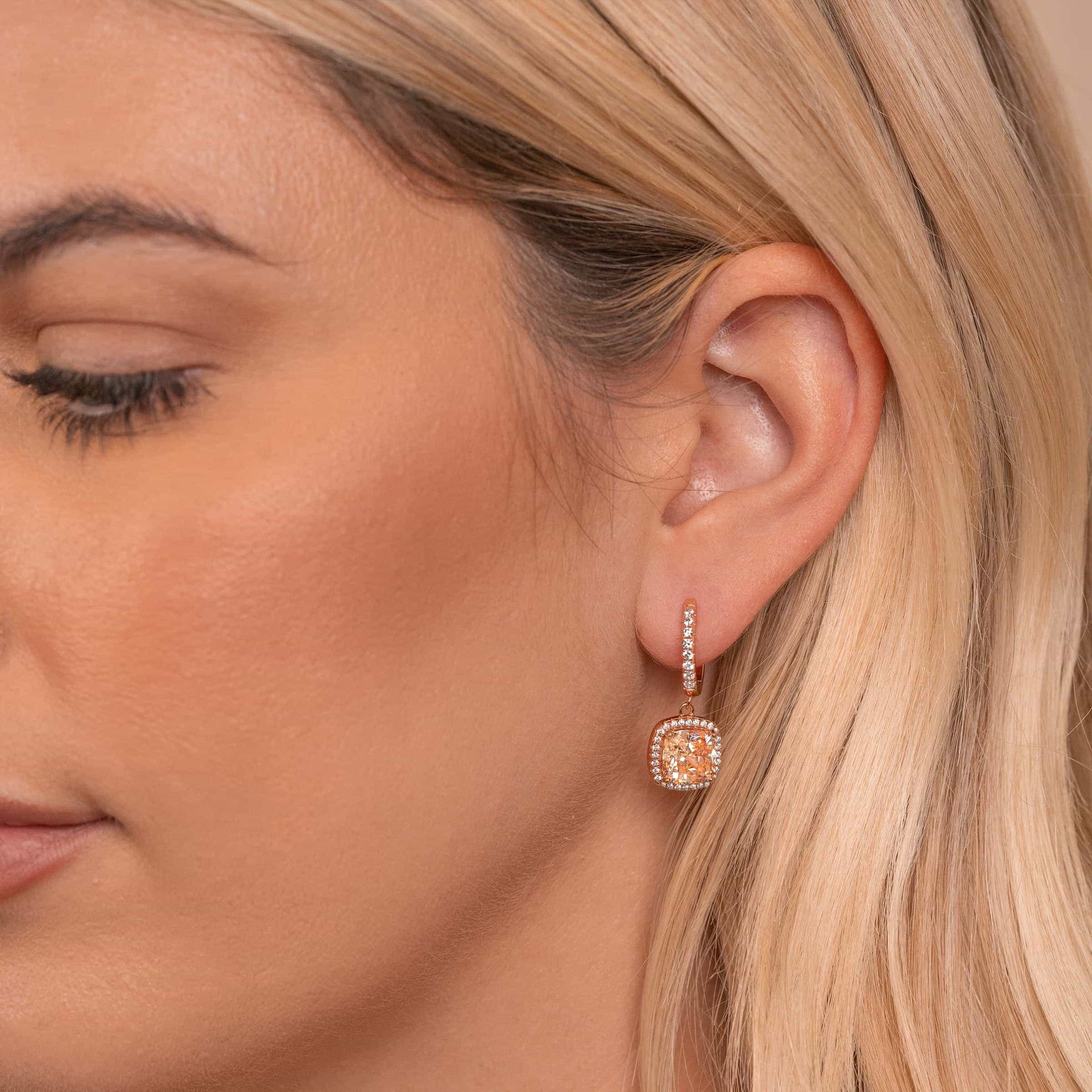Girl wearing rose gold earrings
