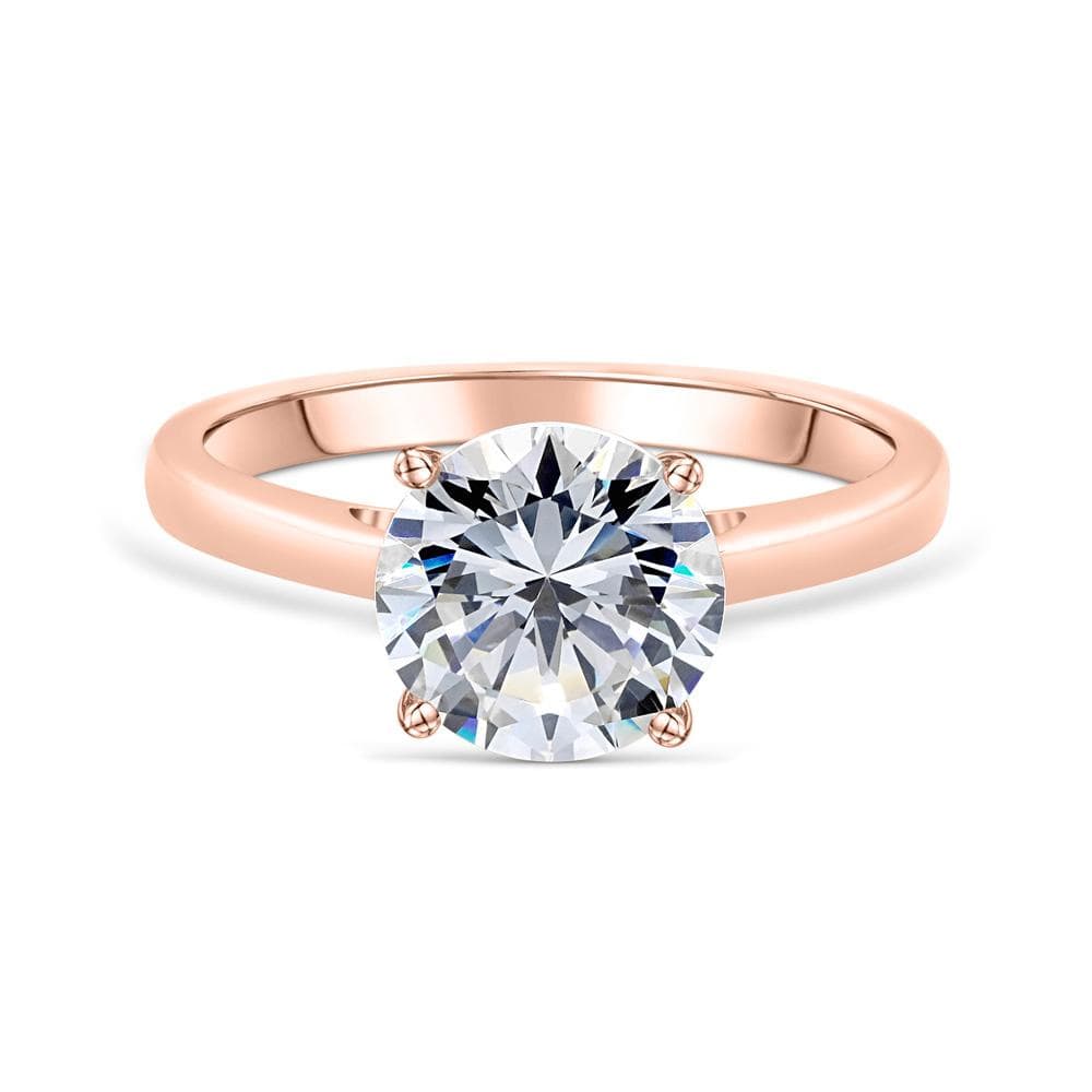 the one and only rose gold round cut solitaire engagement ring