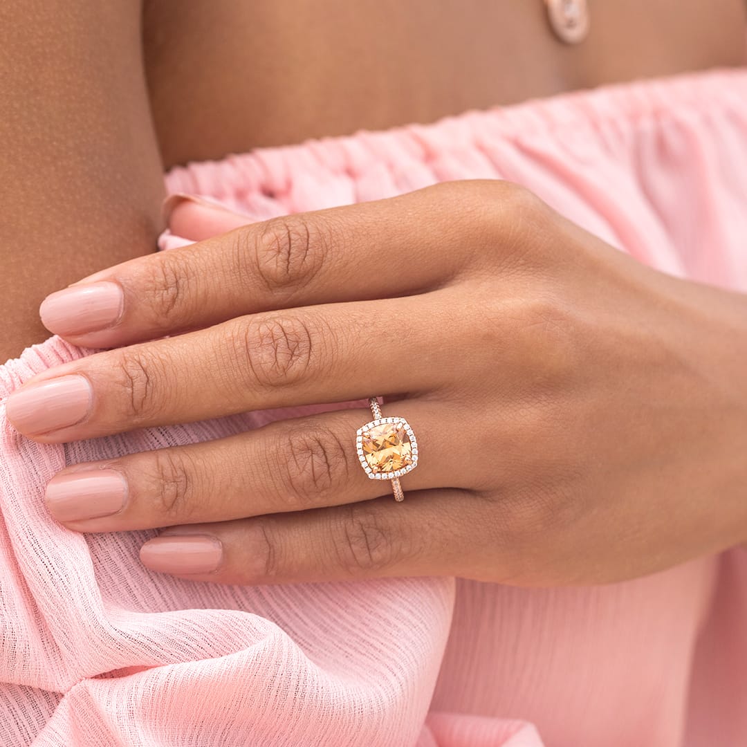 lady wearing rose gold lovely morganite engagement ring