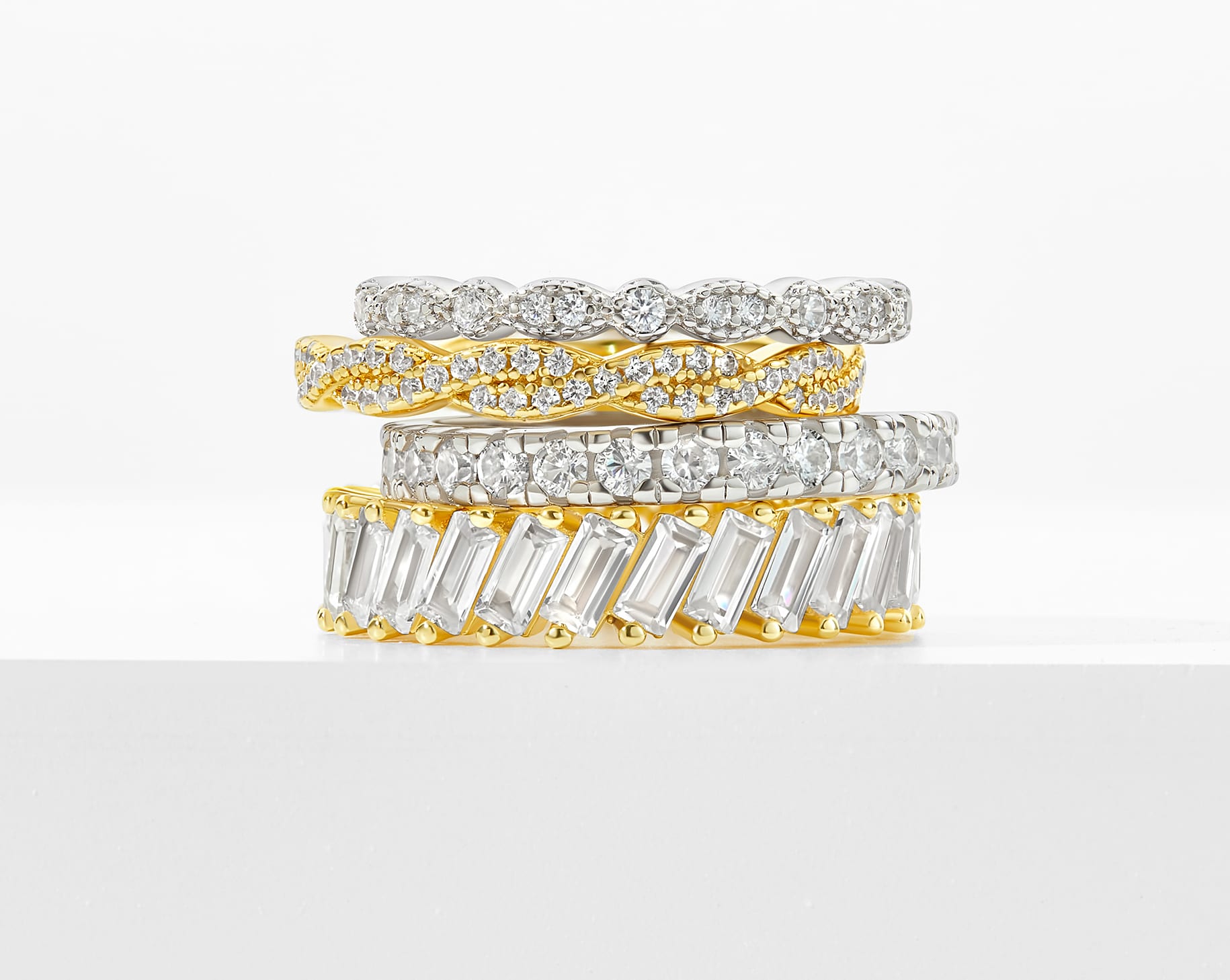 gold and silver wedding band stack