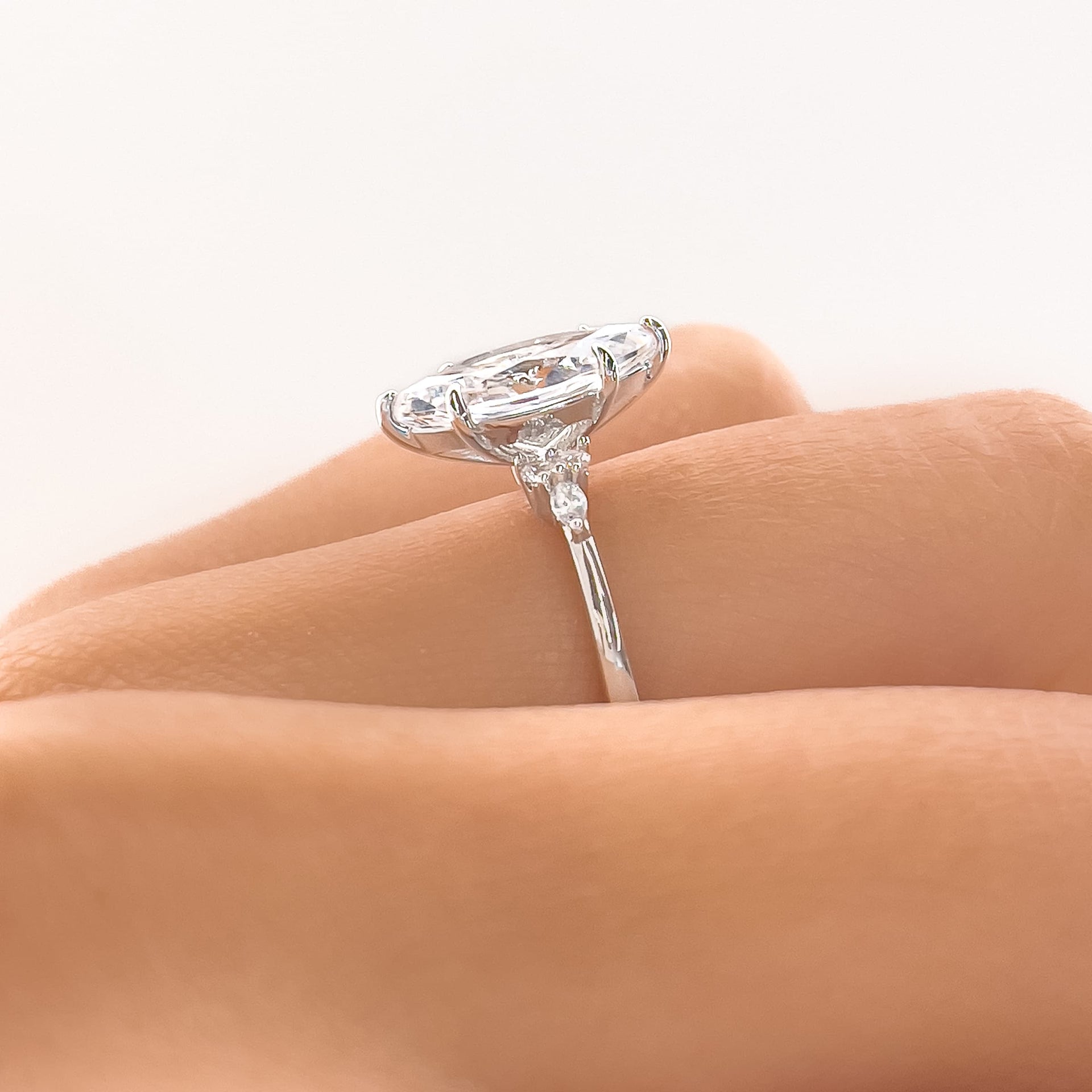 Marquise setting shown on ladies hand in silver