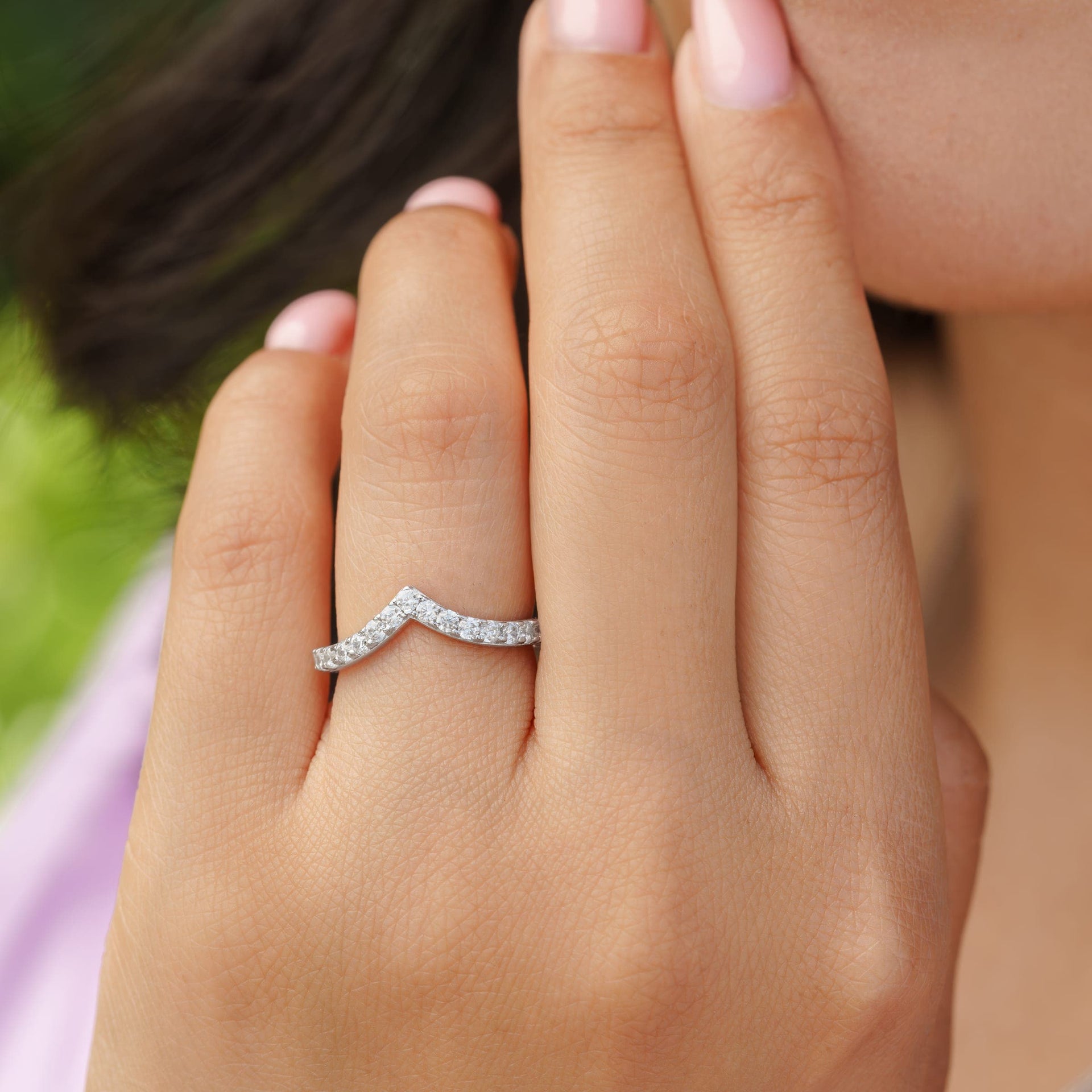 woman wearing unique silver wedding band