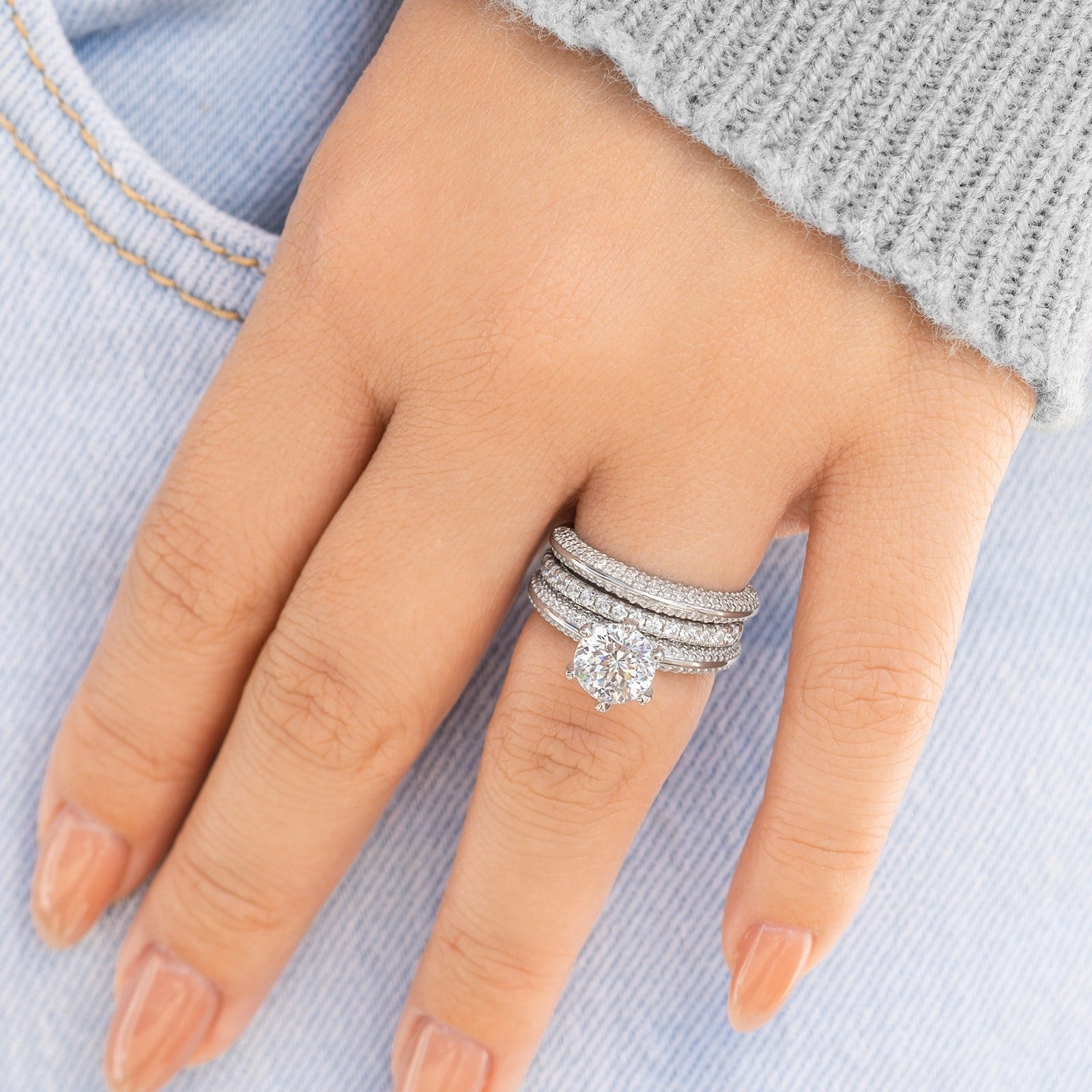 Stunning 2 carat silver wedding ring set modeled on hand