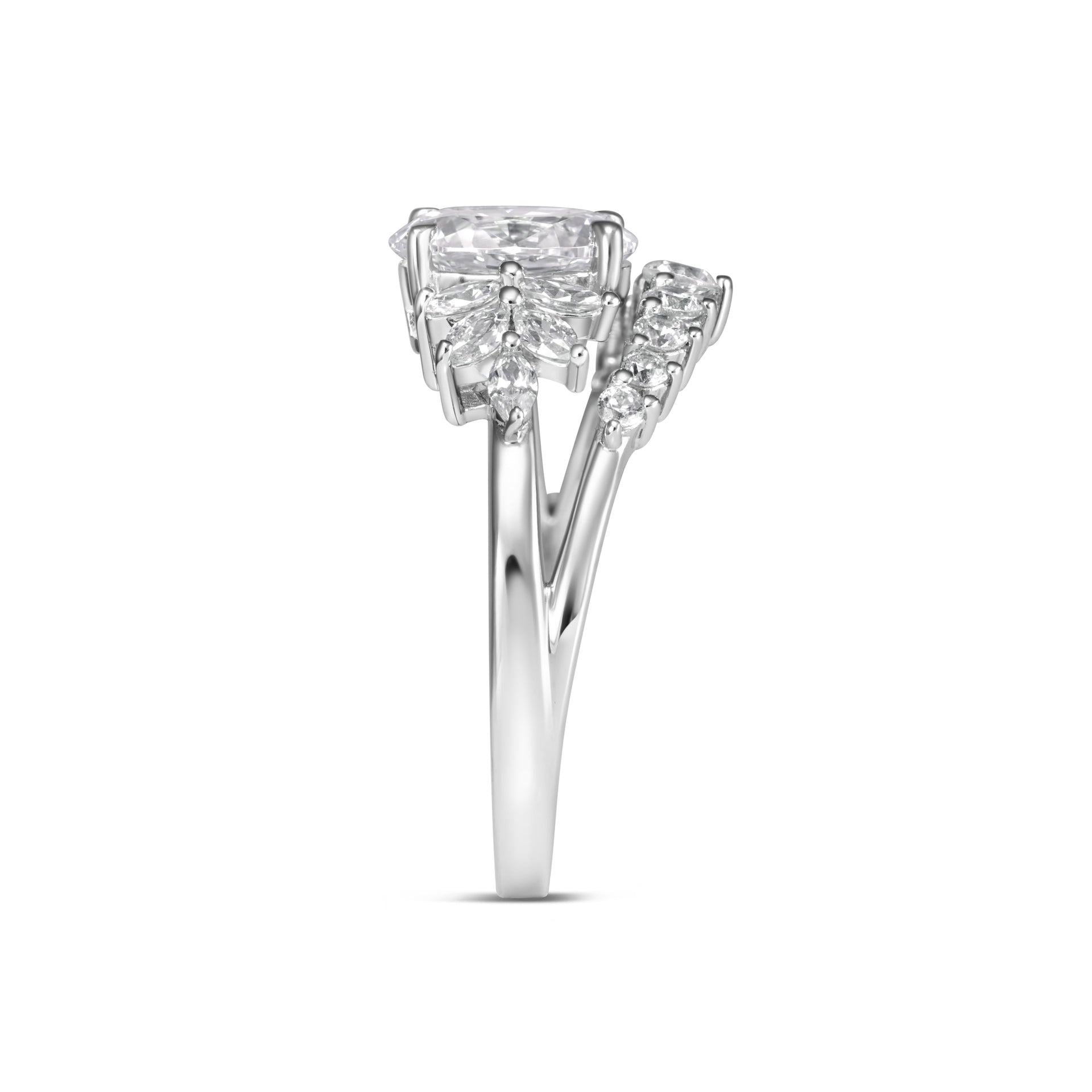 side profile of engagement ring with oval cut center stone and marquise and round side stones.