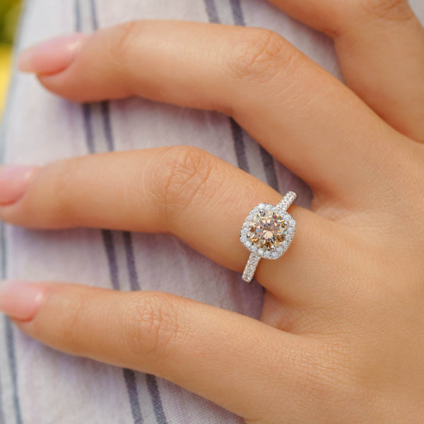 beautiful halo morganite engagement ring on ladies hand