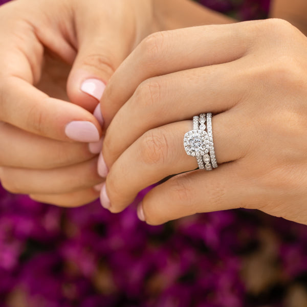 woman wearing triple stack with silver wedding ring set