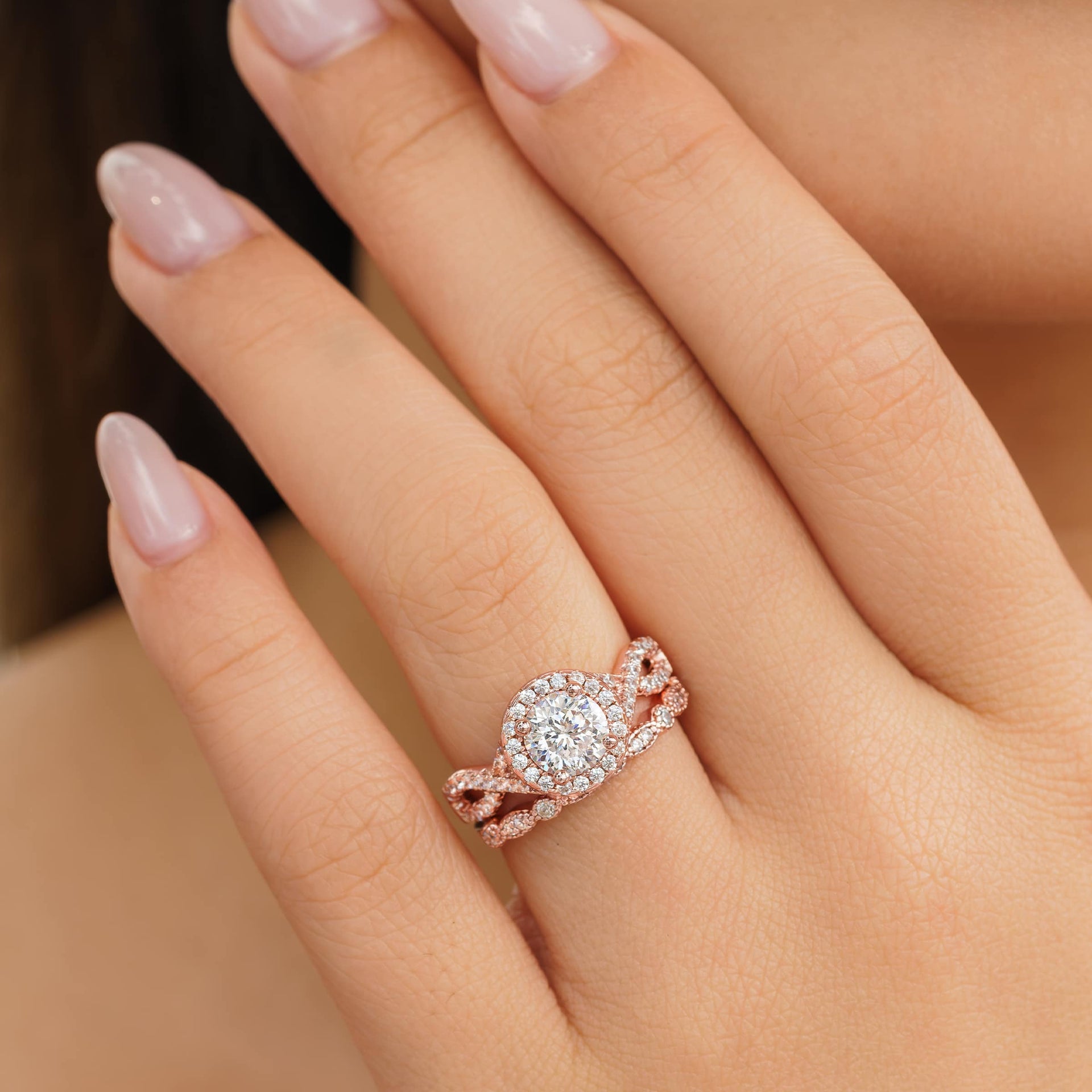 woman wearing rose gold vintage engagement ring