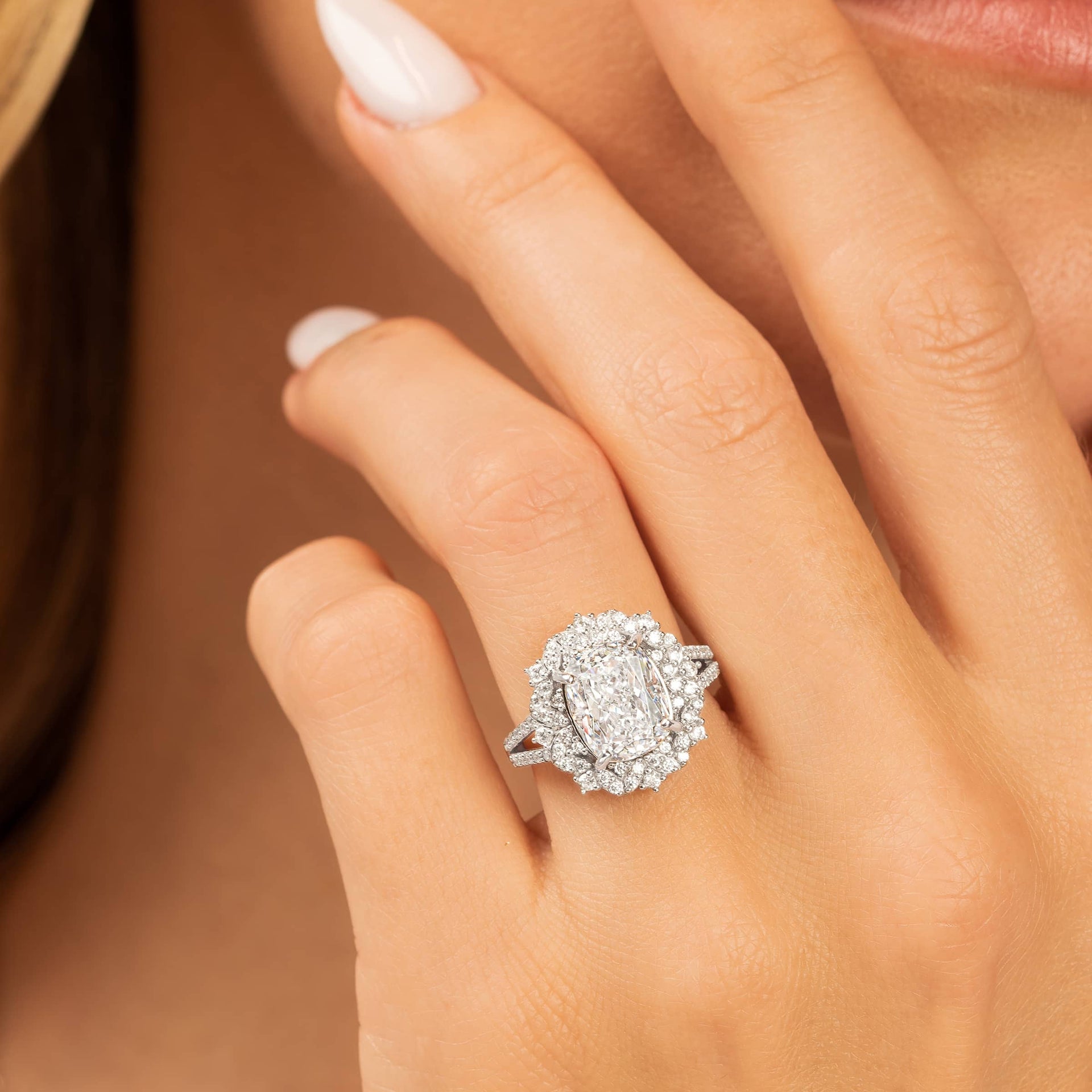 woman wearing silver engagement ring called the sol