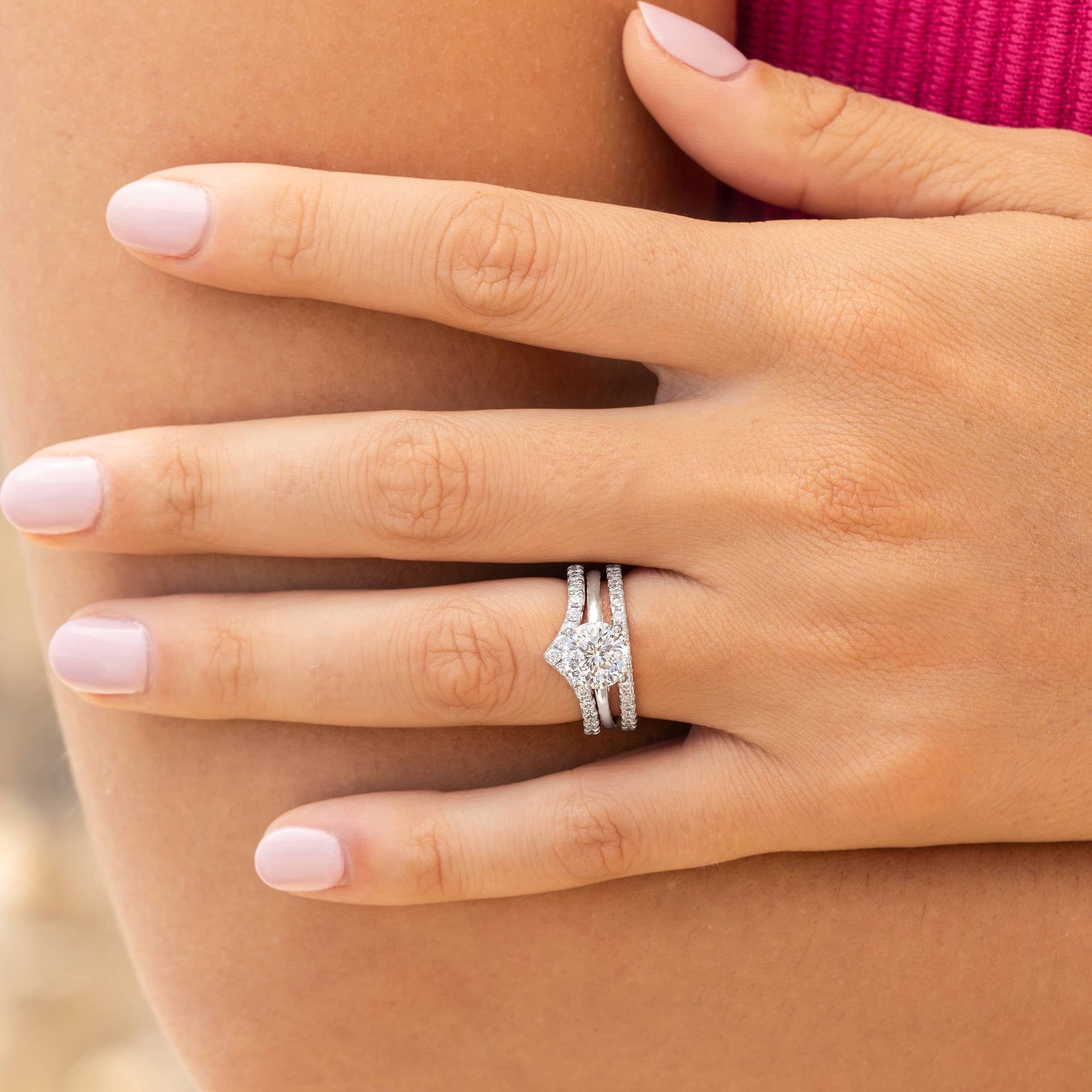 woman wearing triple stack with silver zoey wedding band