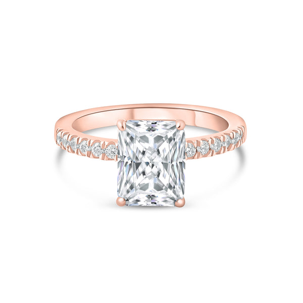 Rose gold 3 carat radiant cut engagement ring with half eternity band detailing
