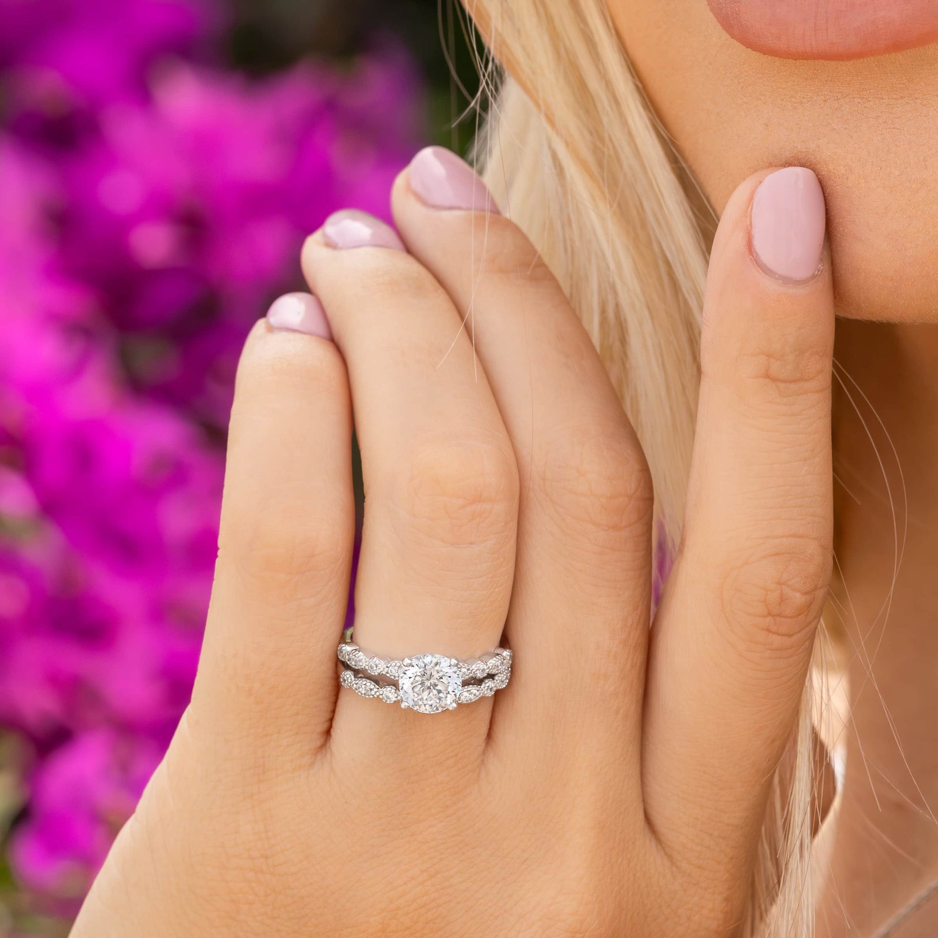 diamond engagement rings on hands