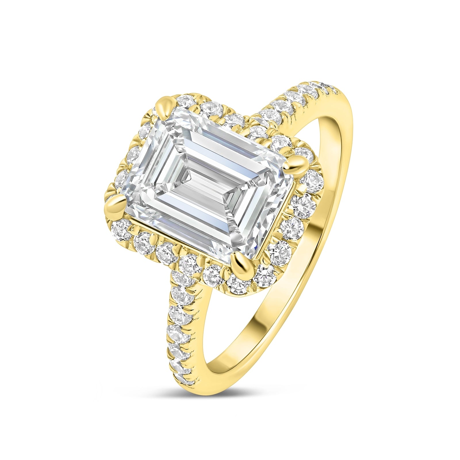 Classic 3 carat emerald cut engagement ring with half eternity band detailing tilted to its side