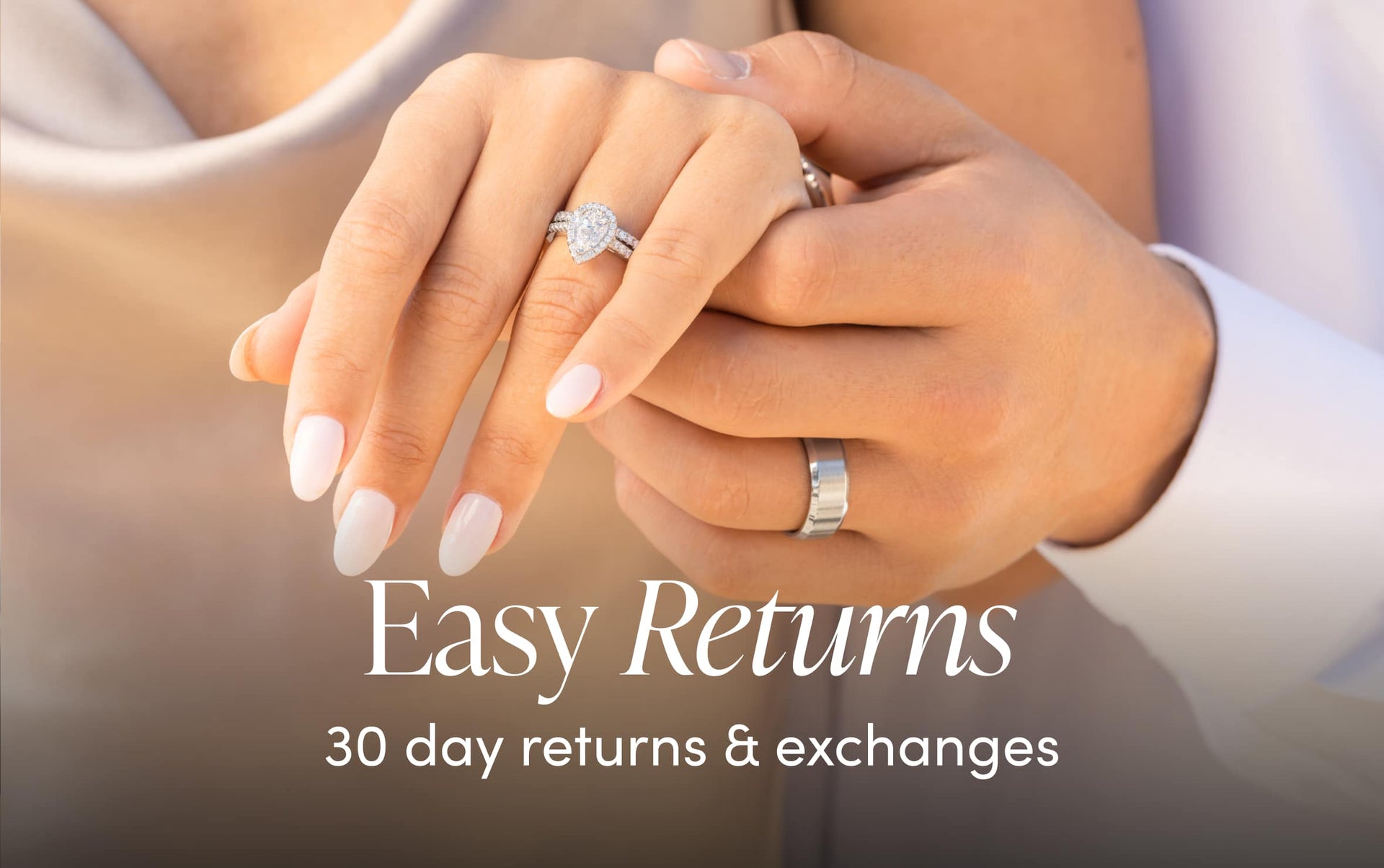 couple holding hands wearing silver wedding rings easy returns and exchanges