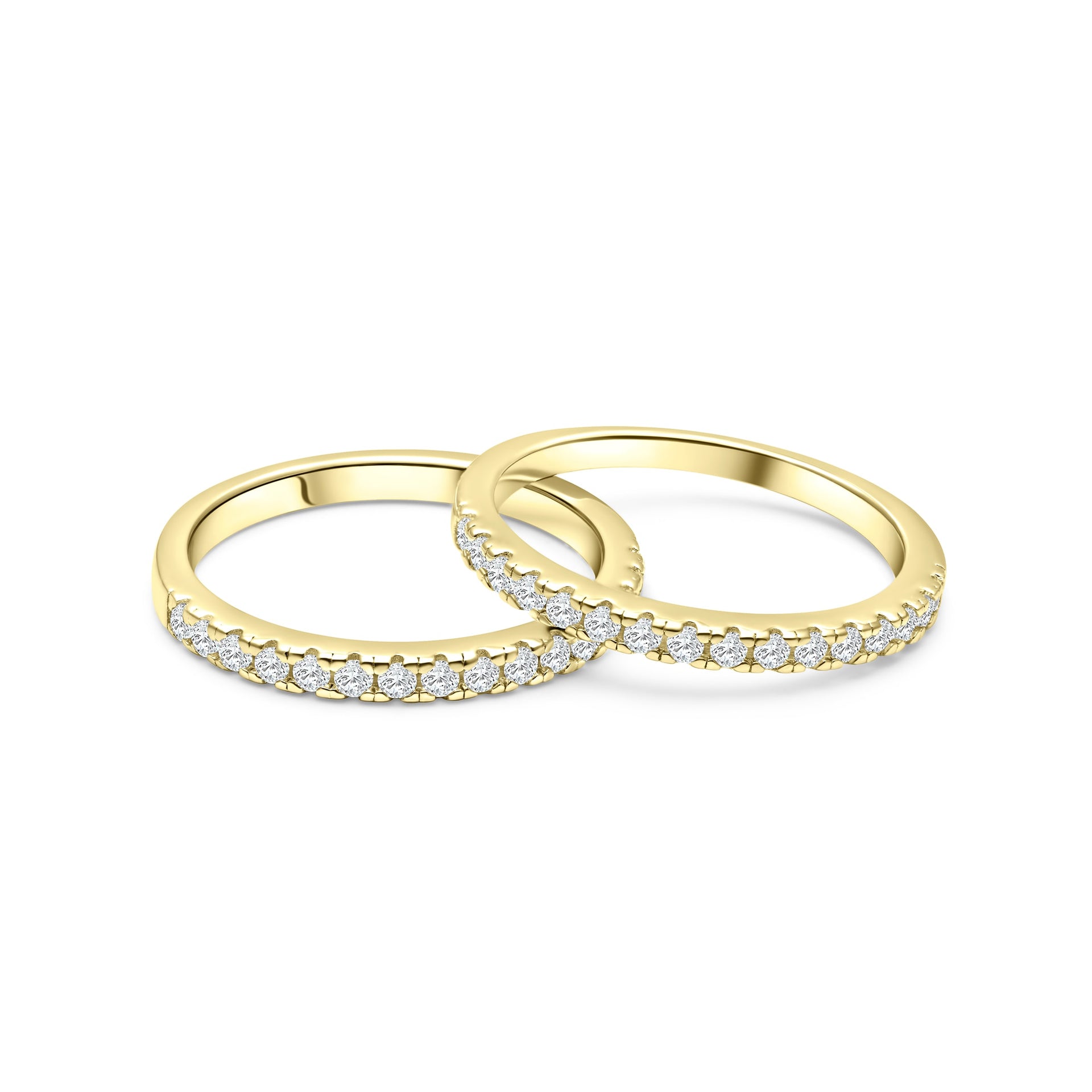 two gorgeous desire engagement rings shown in a duo gold stack