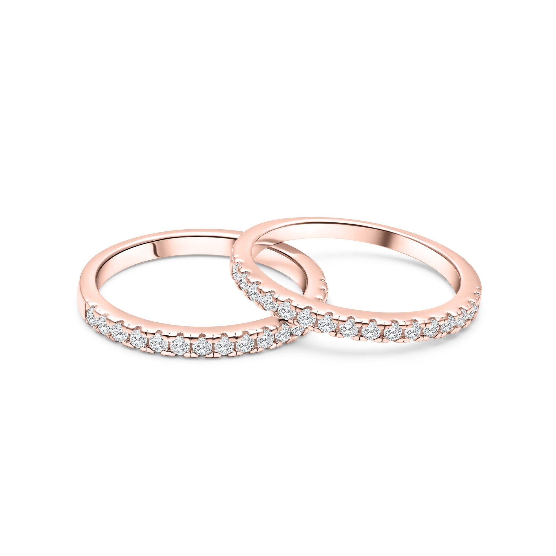two gorgeous desire engagement rings shown in a rose gold duo stack