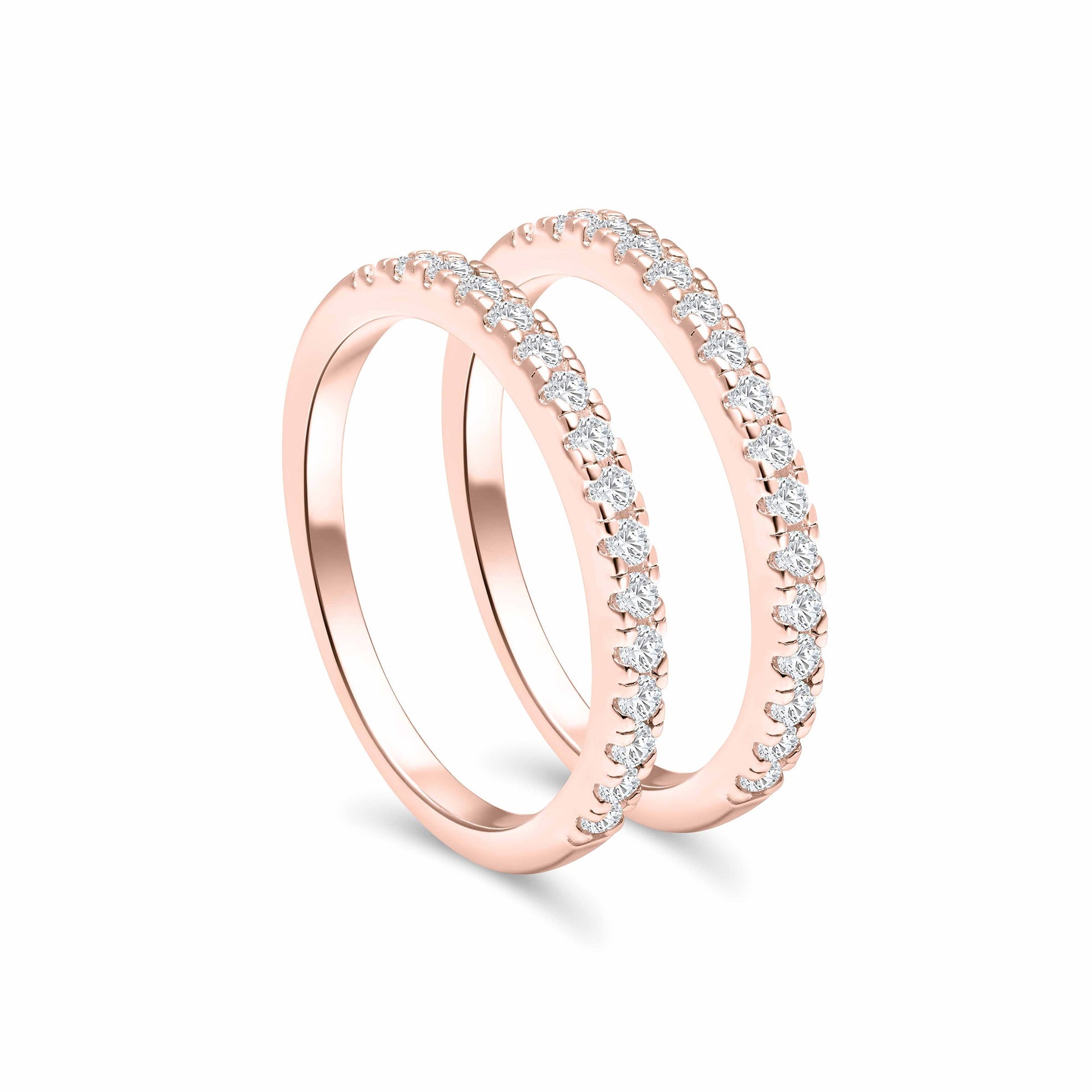 two standing half eternity wedding bands shown in rose gold as a stacking set