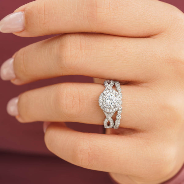woman wearing silver vintage engagement ring with vintage wedding band