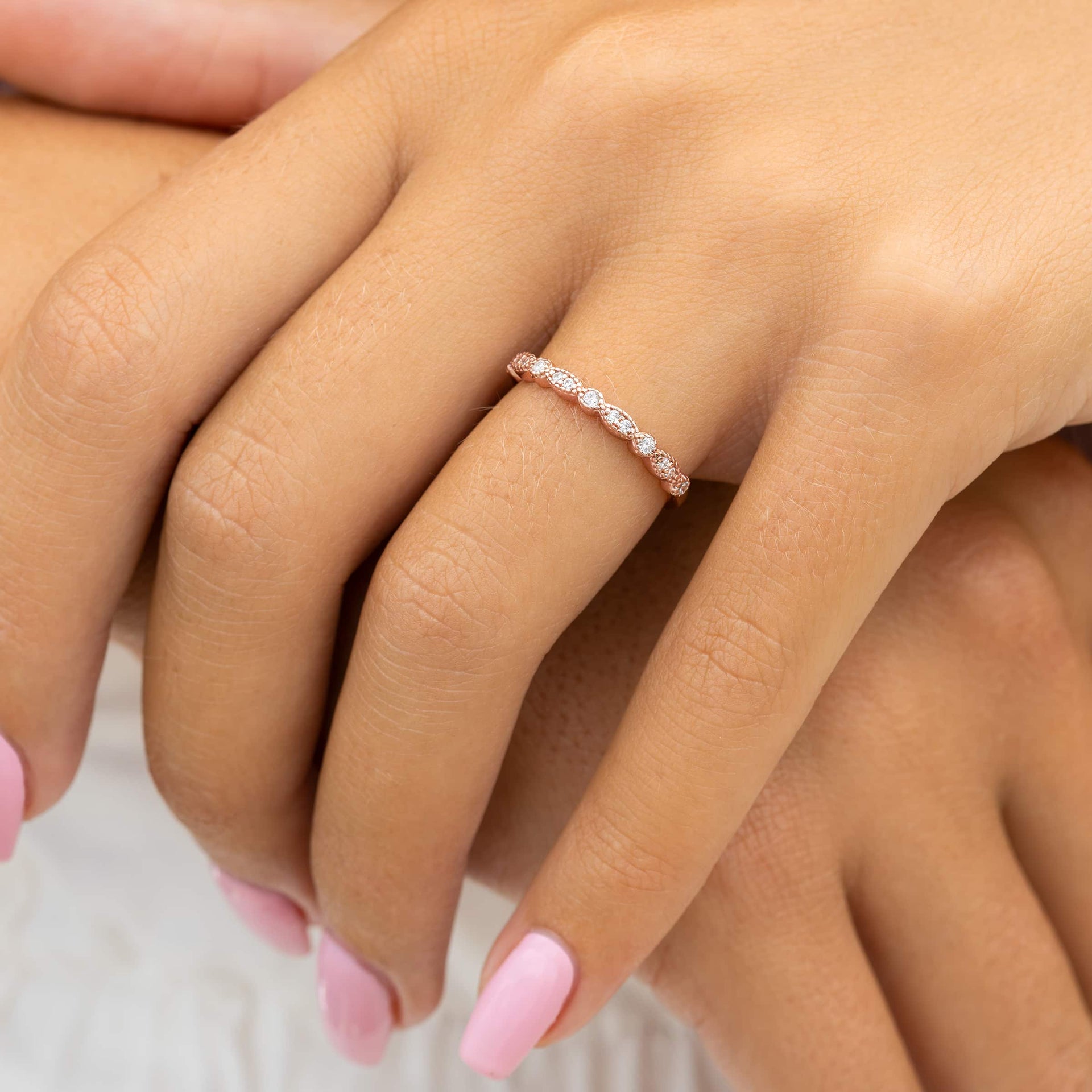 woman wearing rose gold affordable wedding band