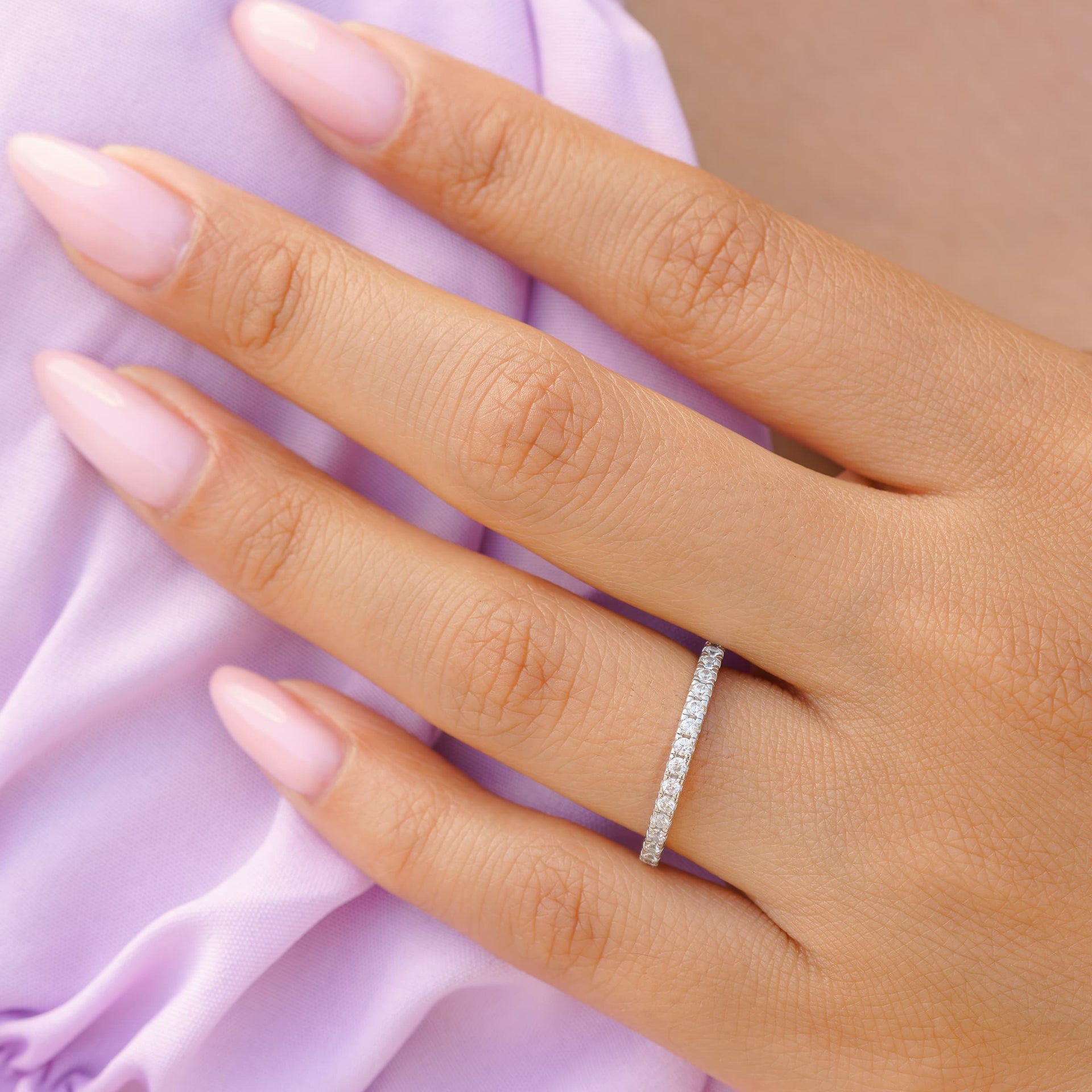 woman wearing silver affordable wedding band