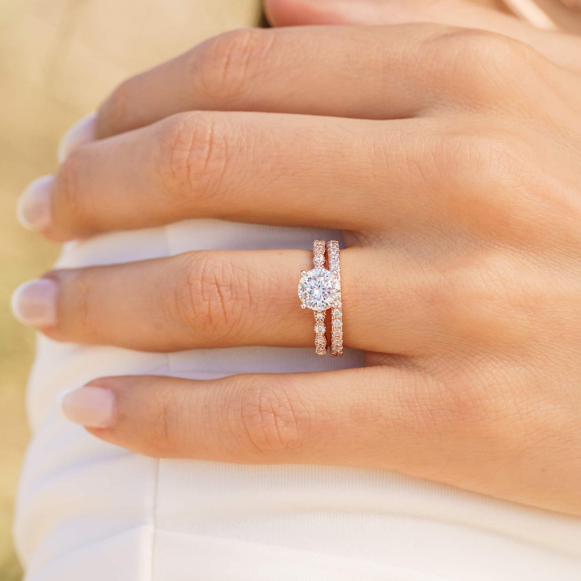 rose gold engagement ring paired with elegant wedding band