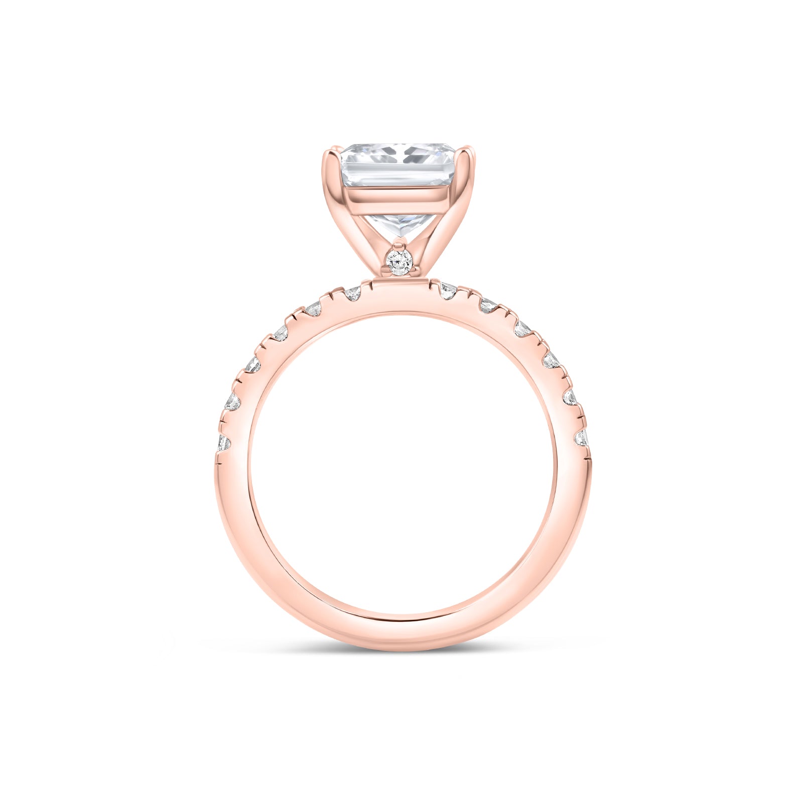Band view of sleek rose gold radiant cut engagement ring with dainty stone detailing under its setting and a half eternity band