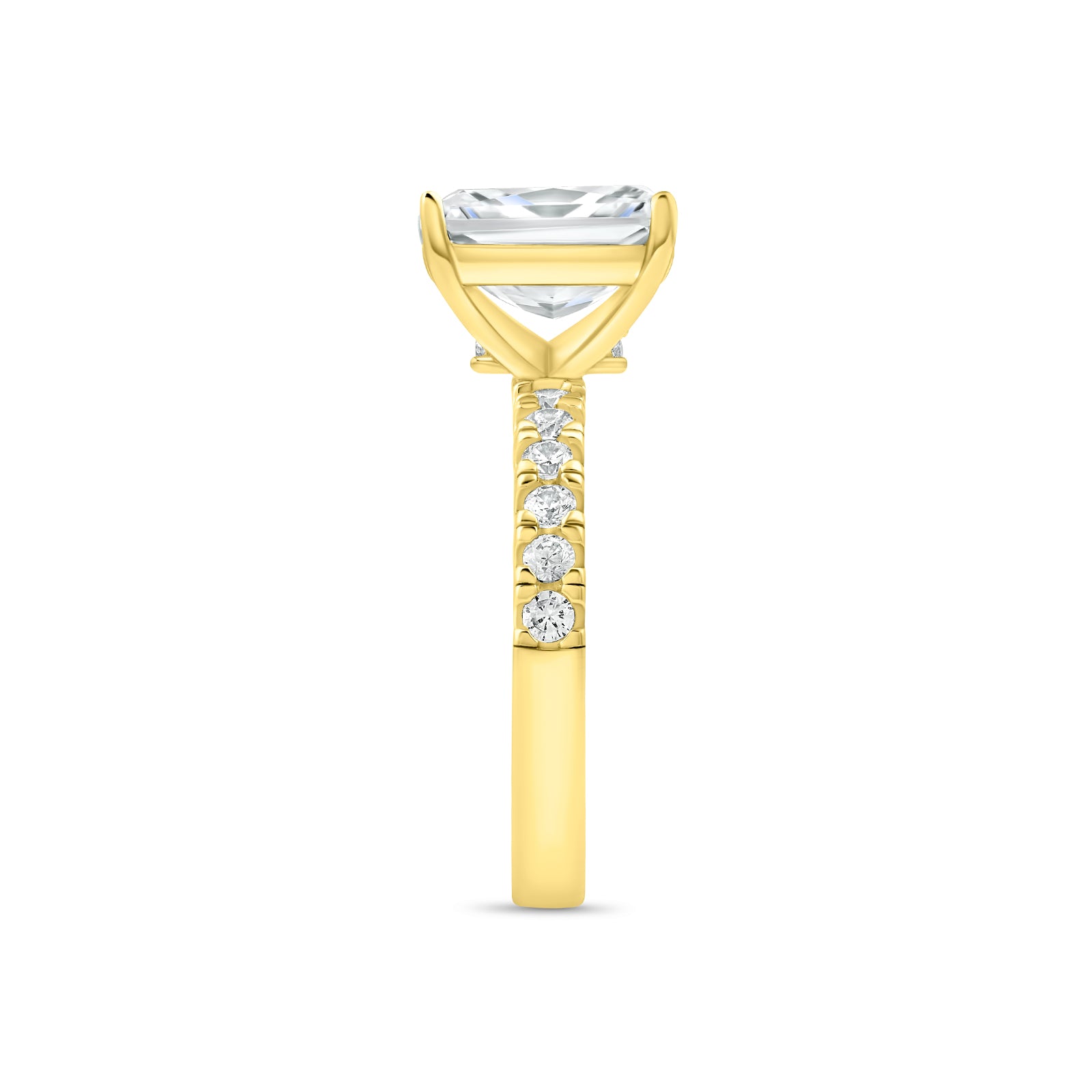 Side profile of gold radiant cut engagement ring with half eternity band detailing