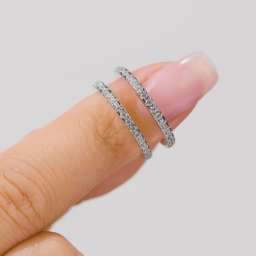 gorgeous video with two desires and engagement rings as wedding stack