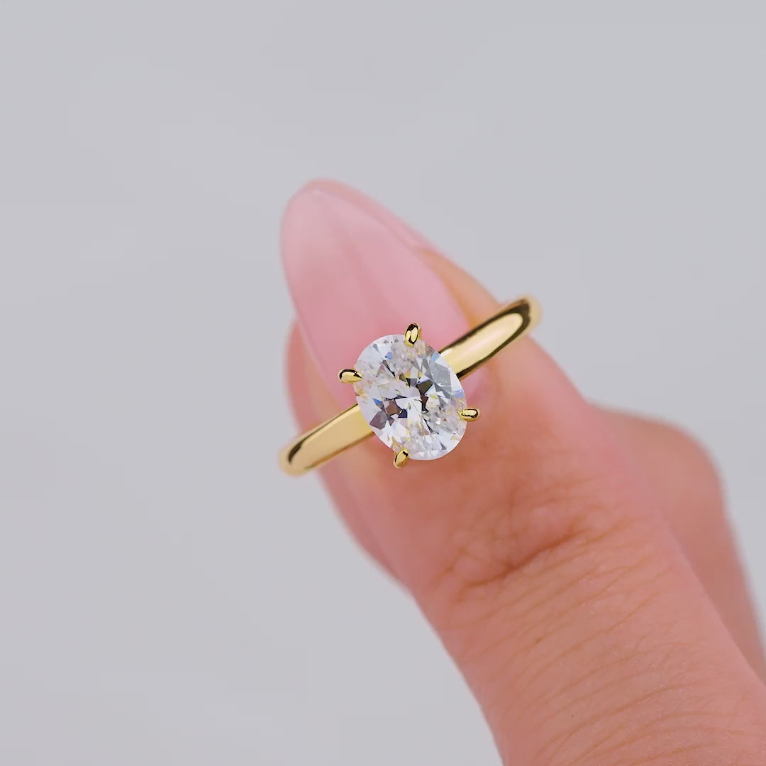 video of beautiful gold engagement ring on model 