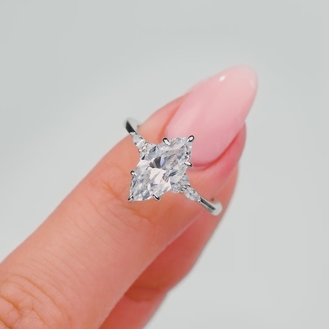 stunning video showcasing silver 2.5 ct marquise engagement ring on ladies hand