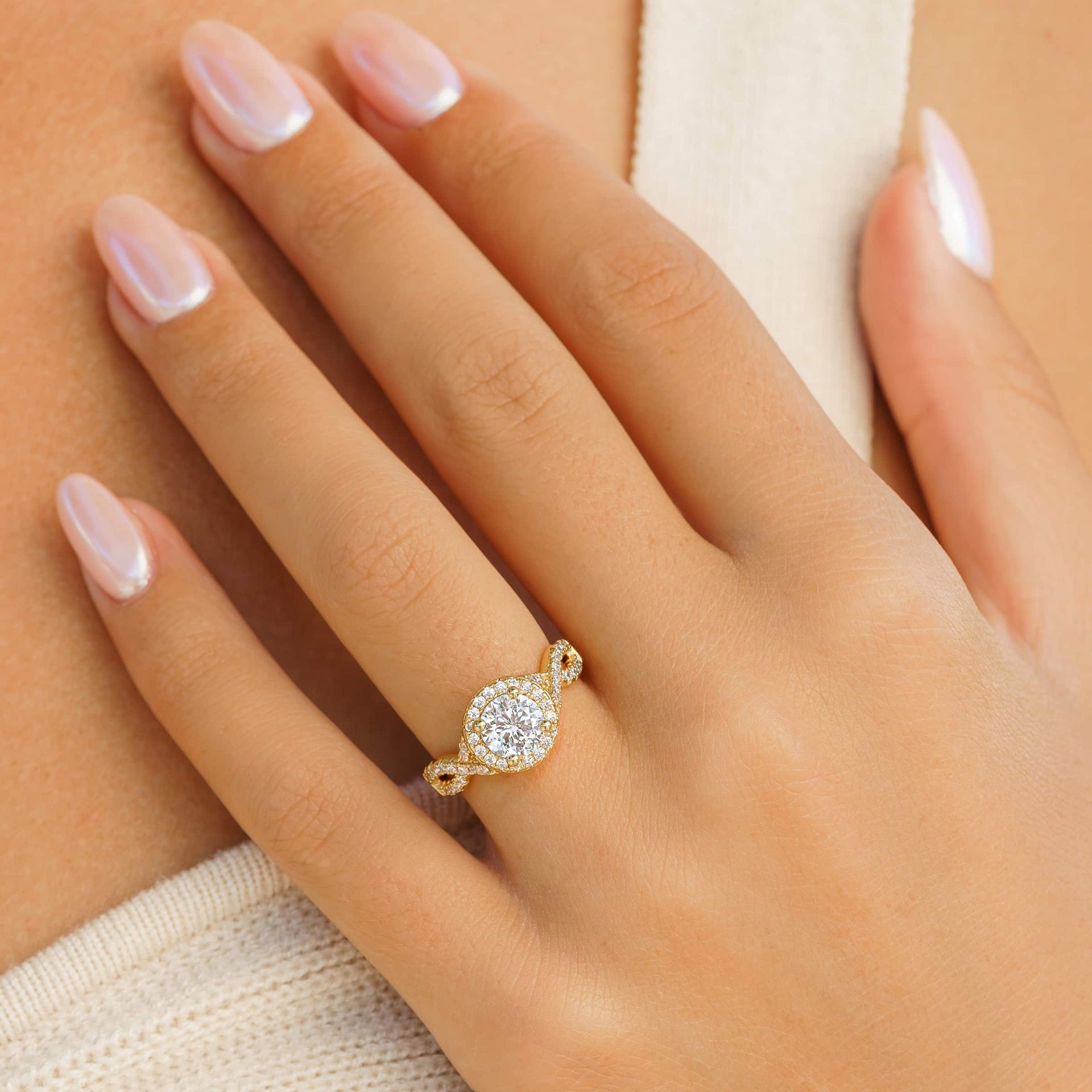 woman wearing gold vintage engagement ring