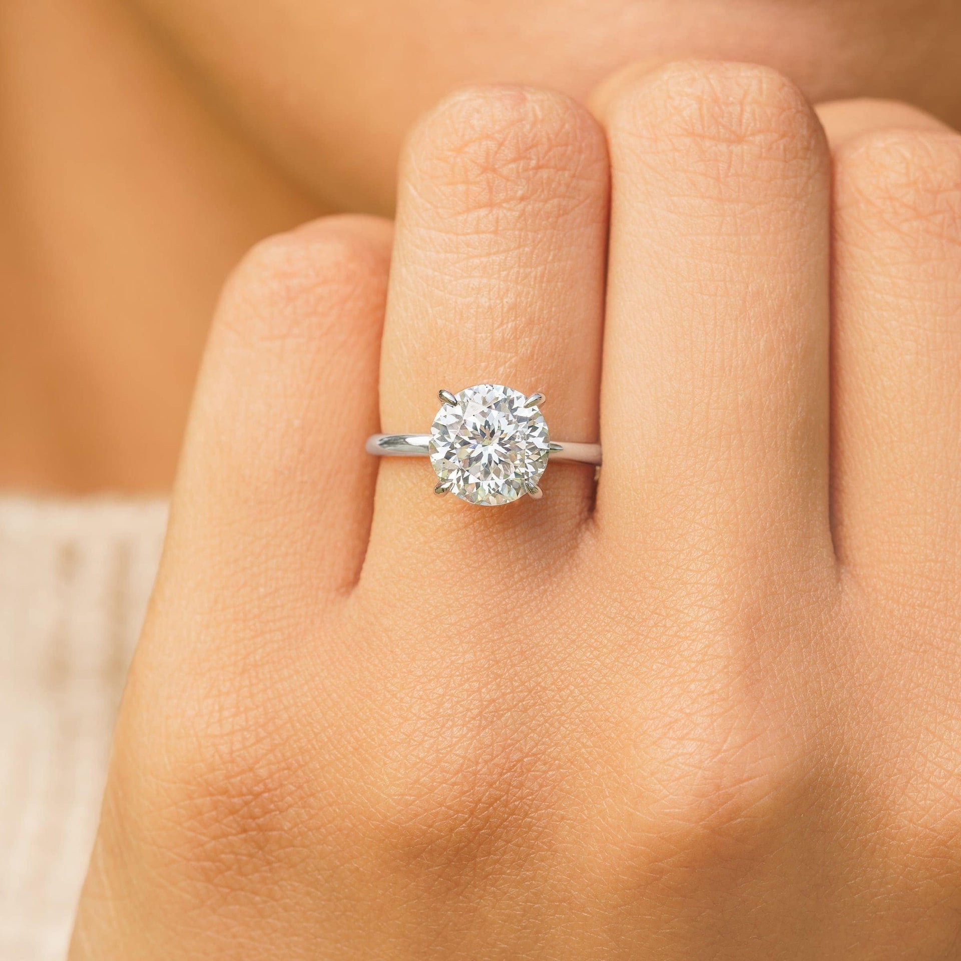 woman wearing silver chelsea engagement ring