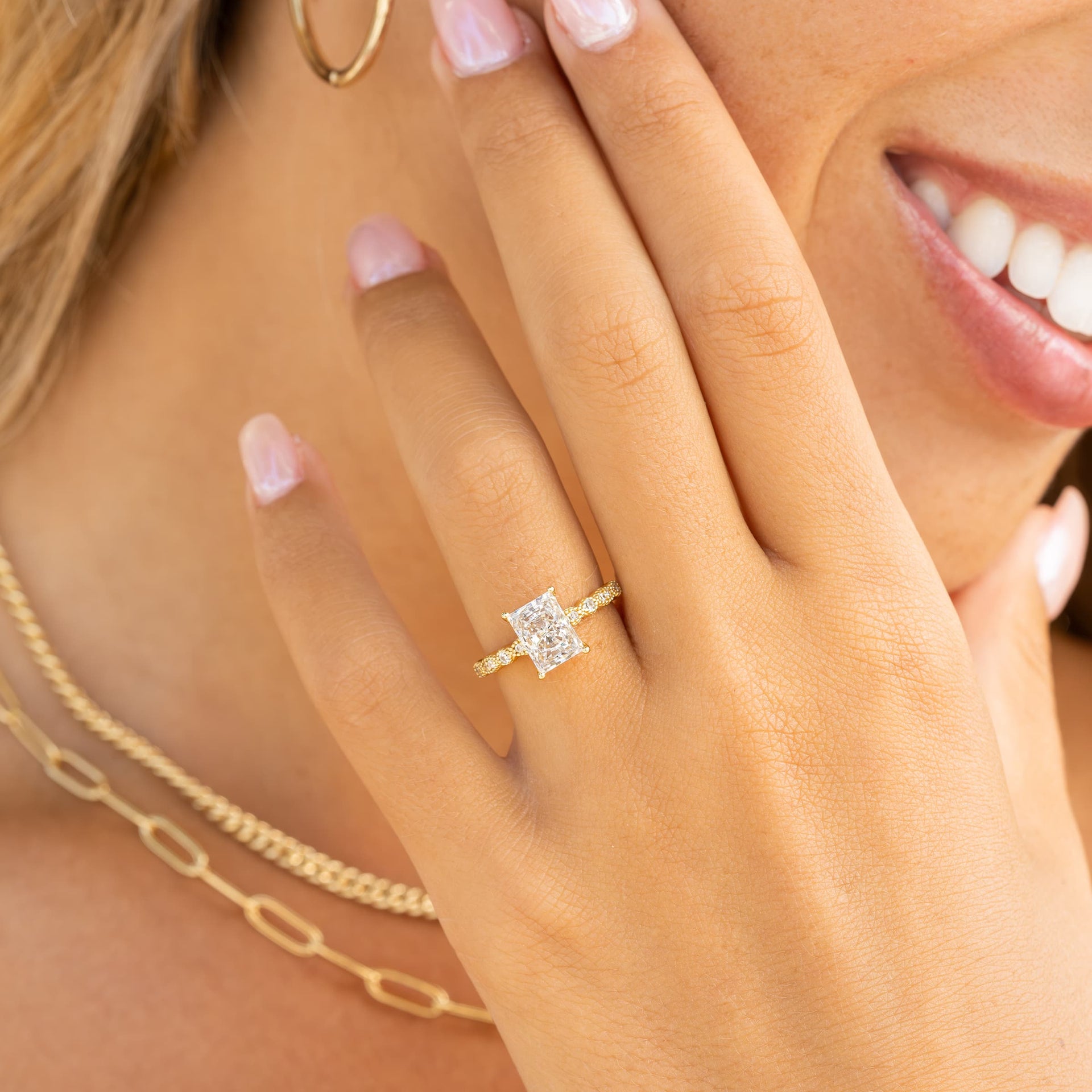 woman wearing gold vintage engagement ring