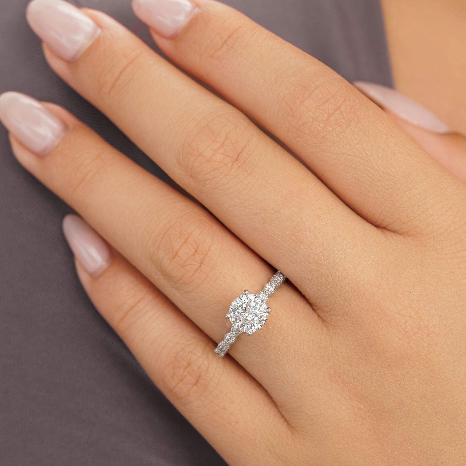 the sofia engagement ring on woman's finger
