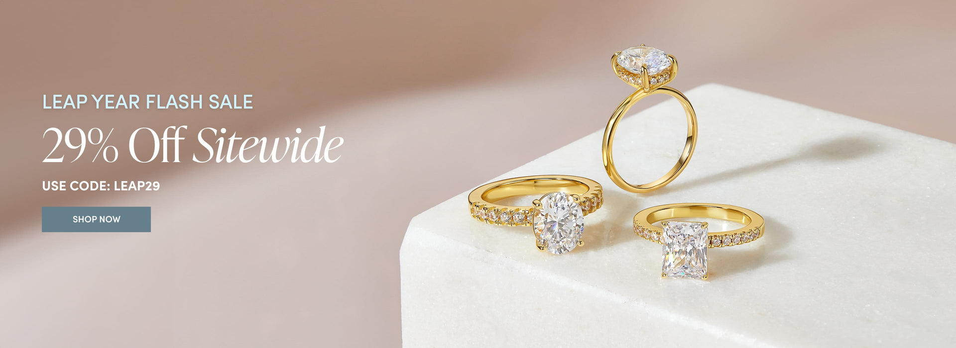 29% off sitewide leap year flash sale with gold engagement rings in stack