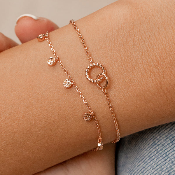 Rose gold chain bracelet with charms