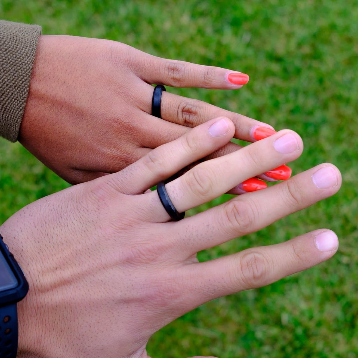 couples wearing the infinity wedding ring