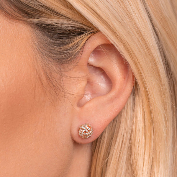 Dainty rose gold knot earrings