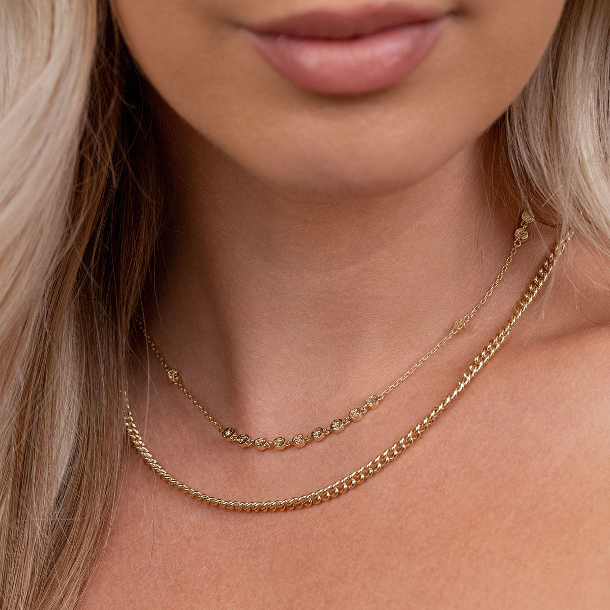 Layered gold chain necklaces