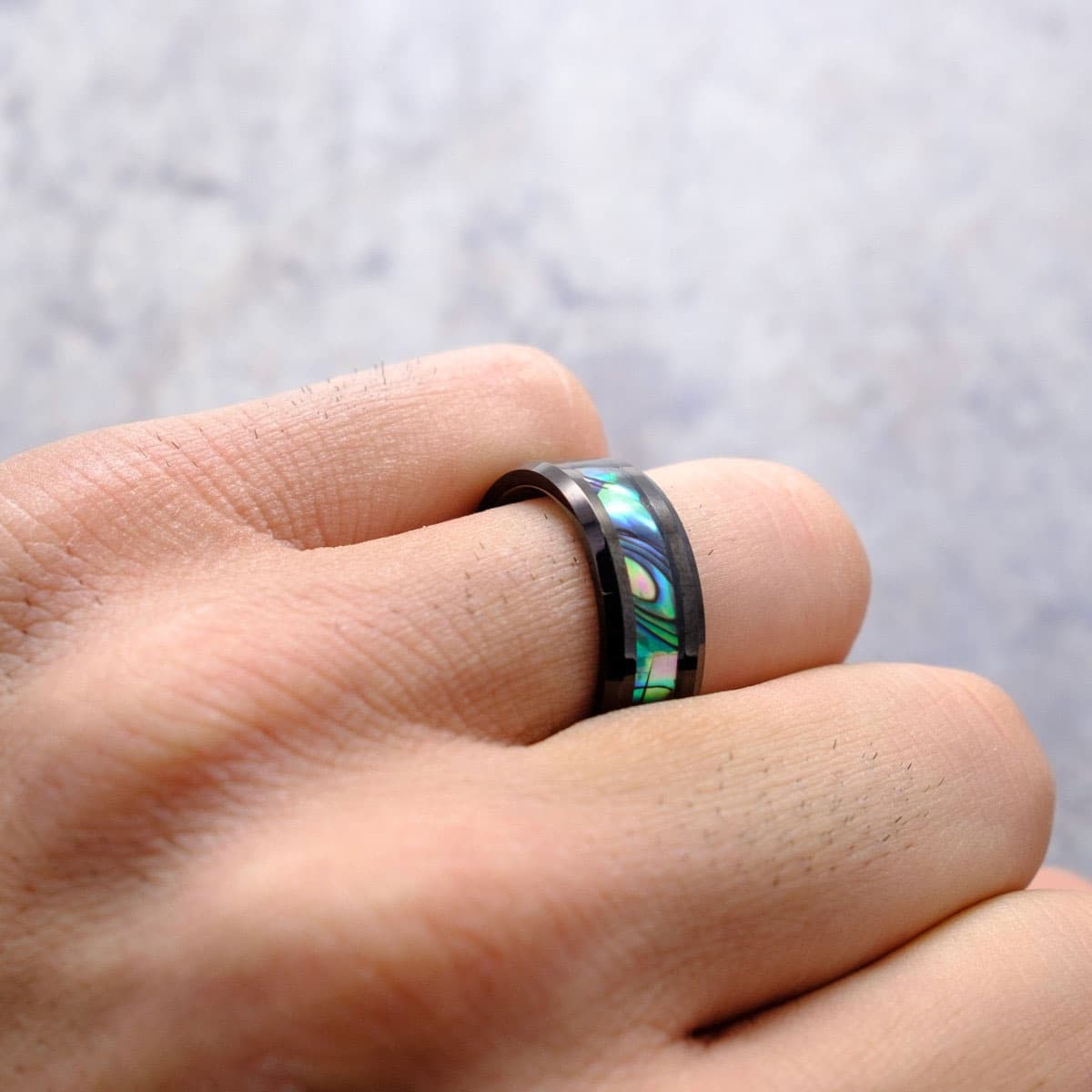 the voyager black tungsten wedding band with abalone inlay