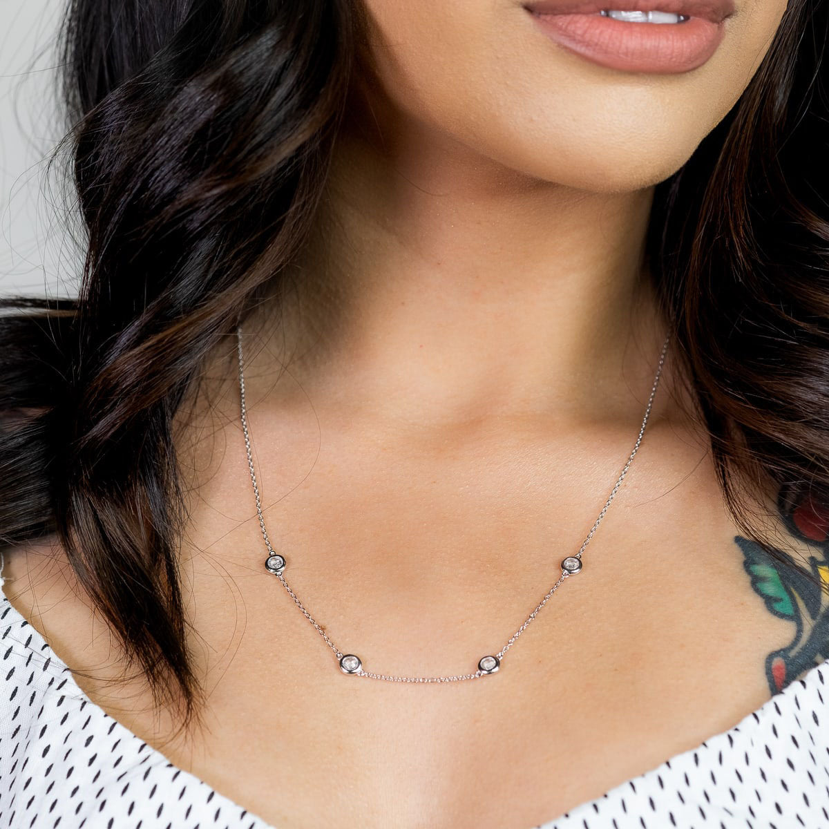 the kali silver necklace on ladies neck