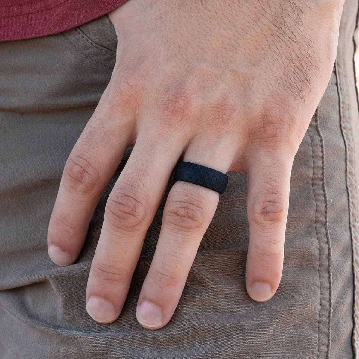 Silicone ring with textured design on a male hand