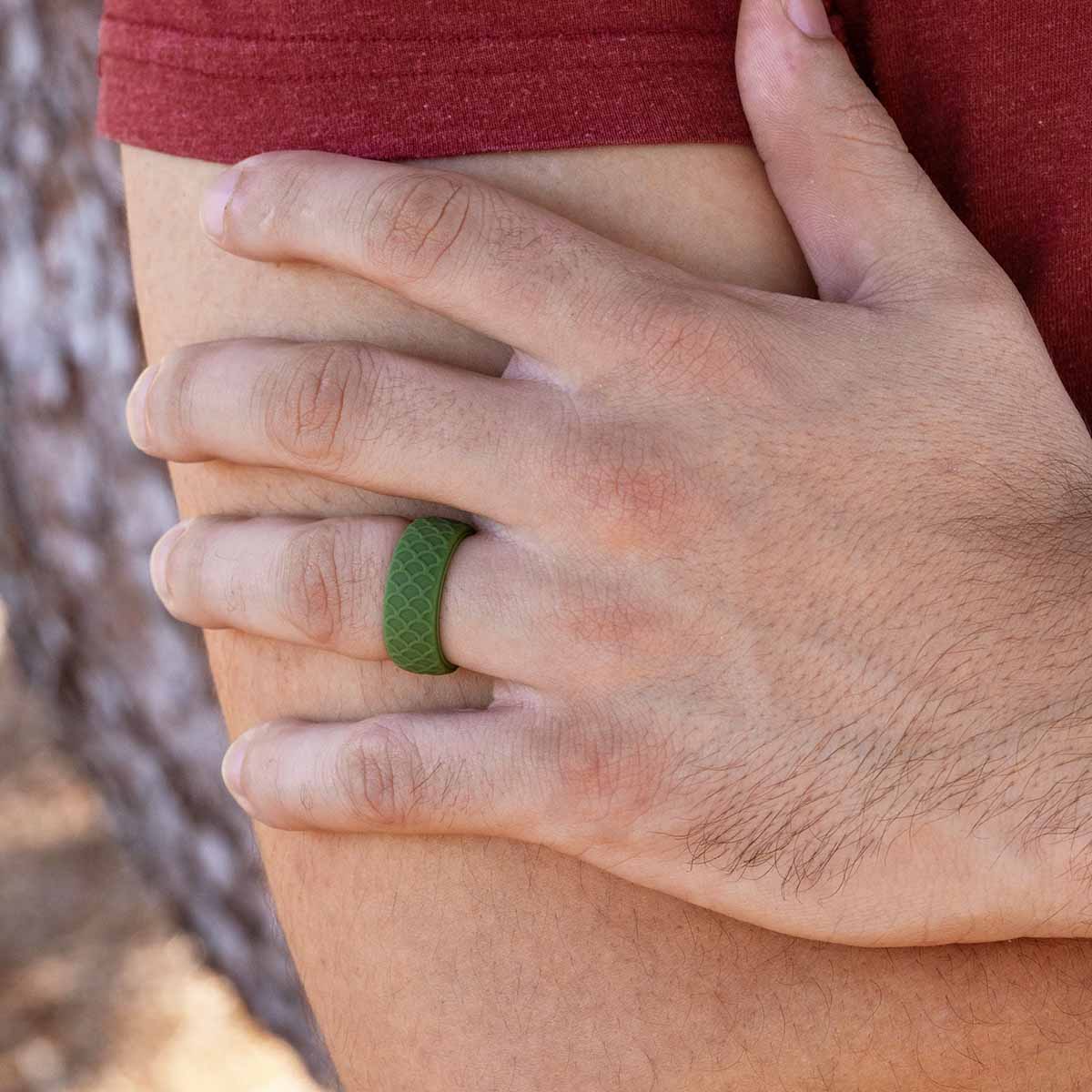 Unique green silicone wedding ring on male hand