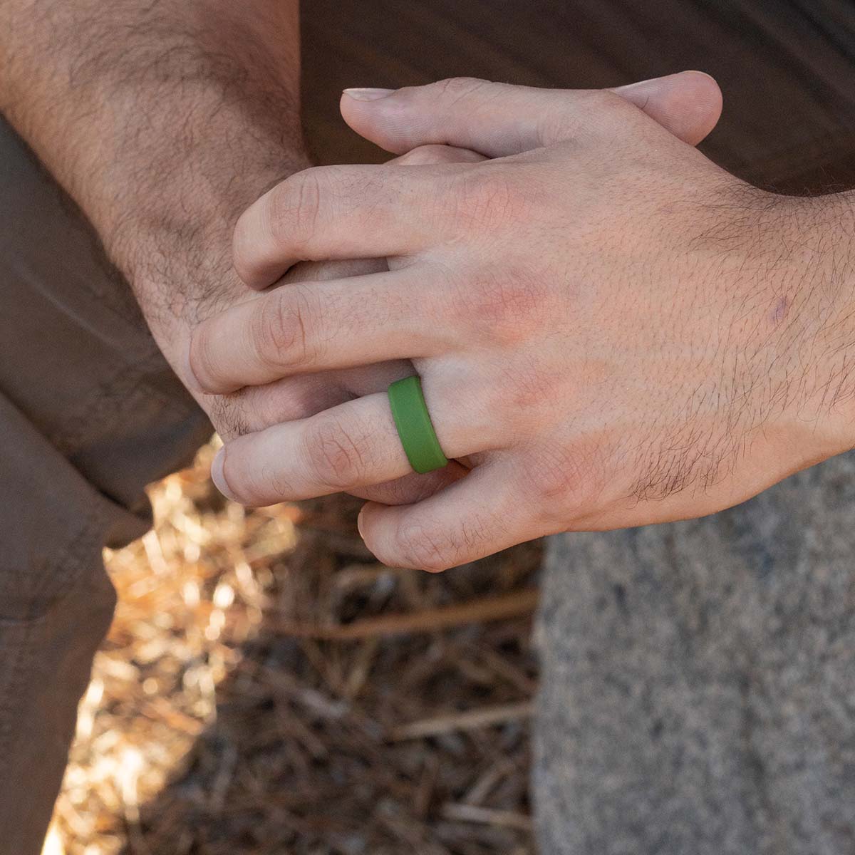 Unique green silicone wedding ring on male hand