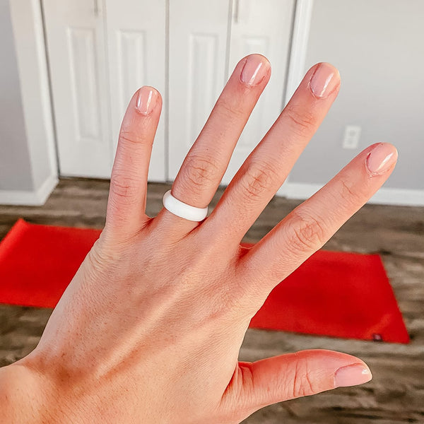 hand with white flex silicone wedding ring