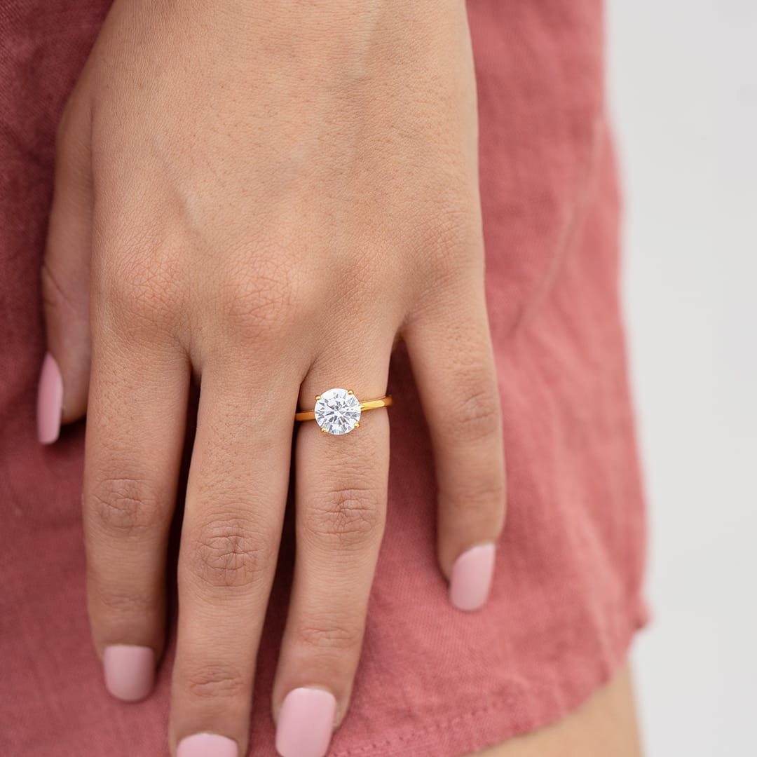 the one and only gold round cut engagement ring